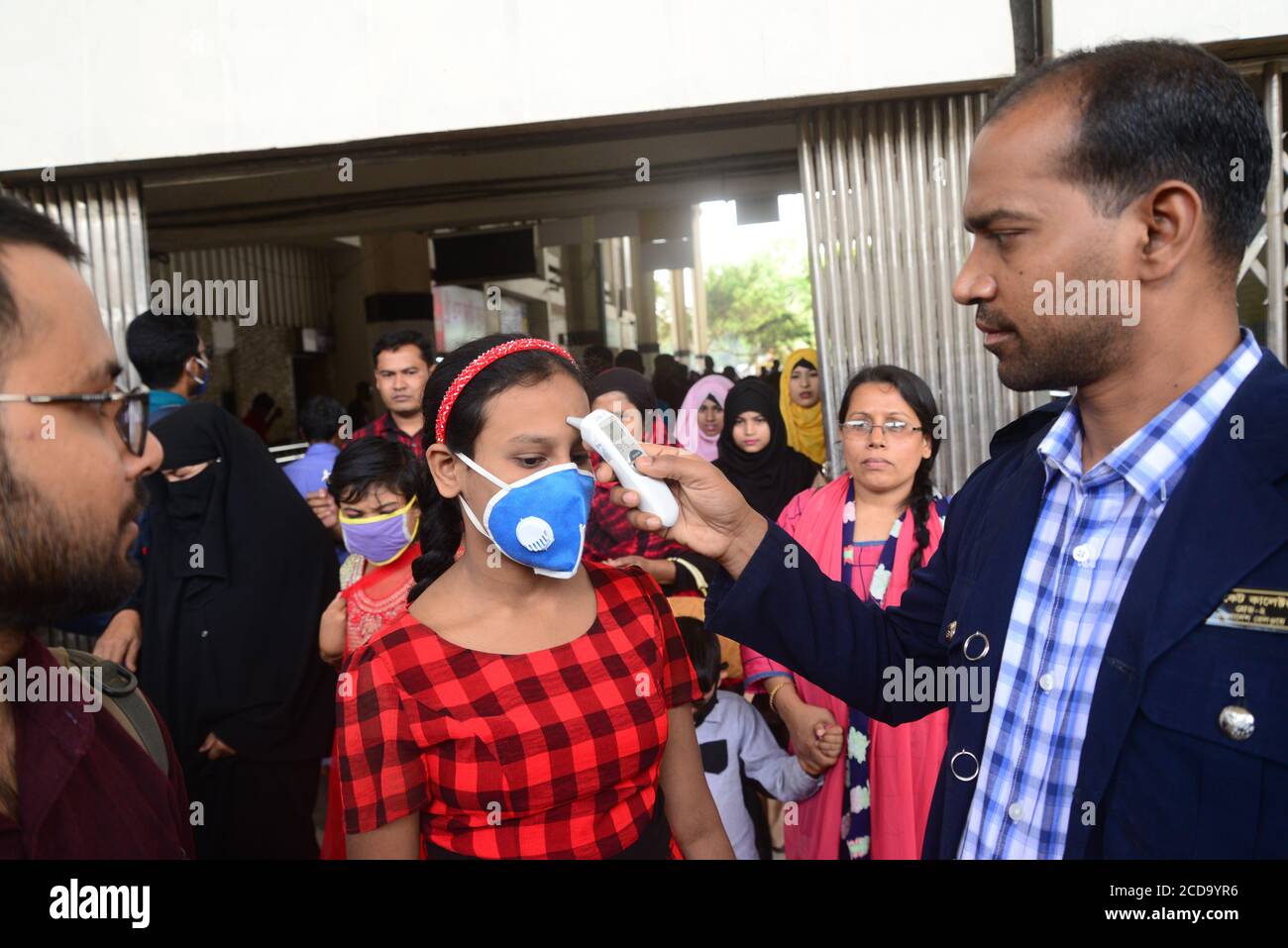 Bangladeshi Railway staff official Thermal screening of passengers is being conducted in the wake of deadly coronavirus, at a Railway Station in Dhaka Stock Photo