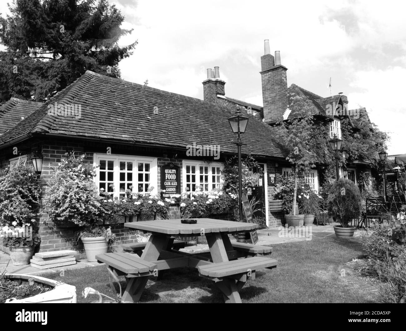 Black & White image of a typical village pub in Winchester England UK stock photo image Stock Photo