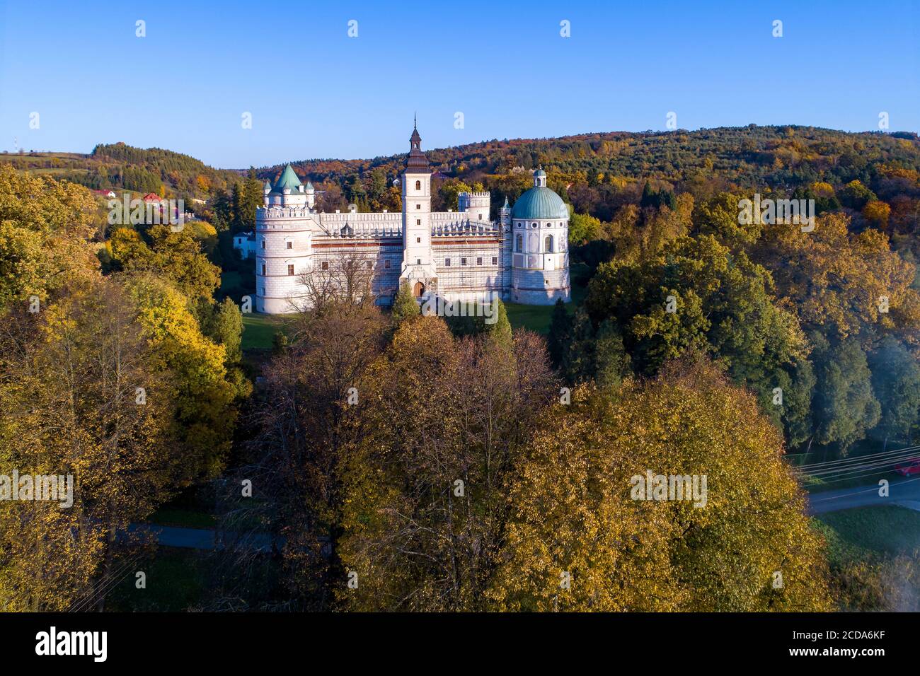 Renaissance castle and park in Krasiczyn near Przemysl , Poland. Aerial view in fall in sunset light Stock Photo
