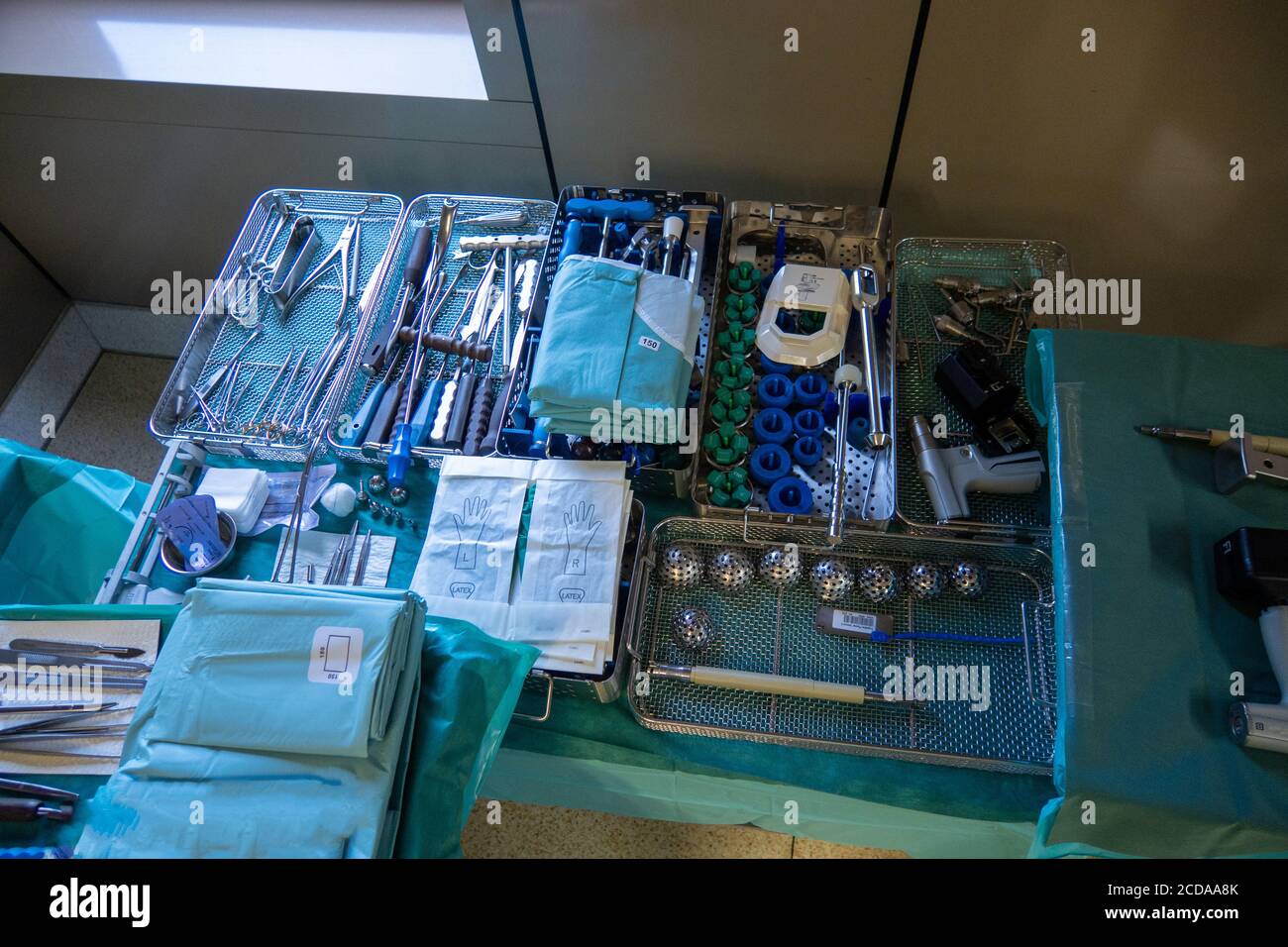 in an operating room there are many instruments for performing a hip implantation Stock Photo