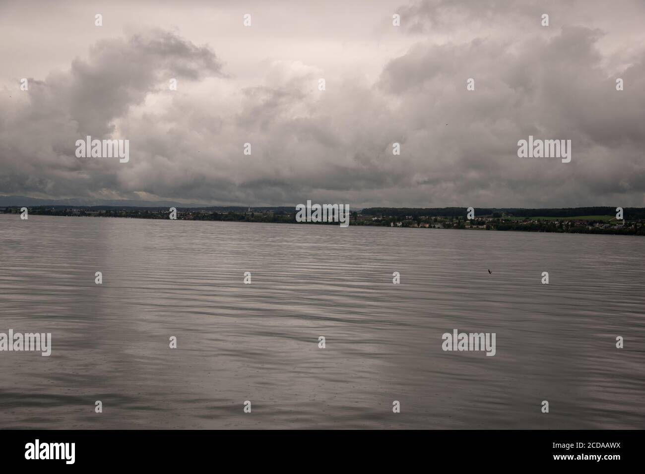 grey-water-of-the-sea-under-the-cloudy-sky-on-a-gloomy-day-stock-photo