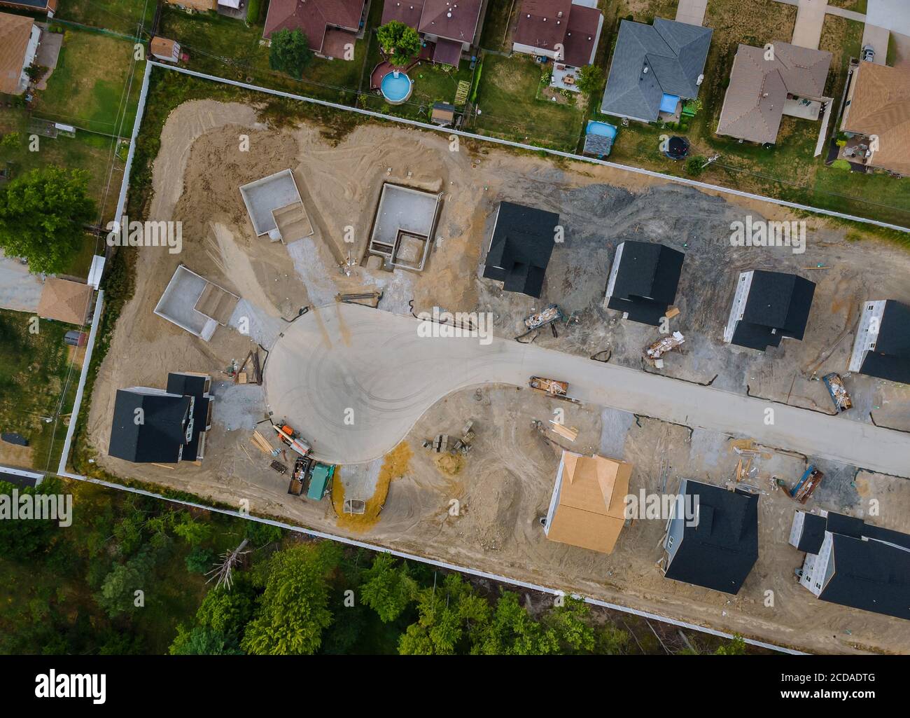 A residential aerial view of a new housing development being built of a