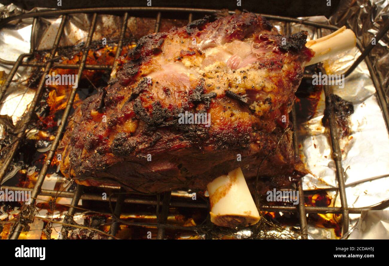Roast lamb shoulder Stock Photo - Alamy
