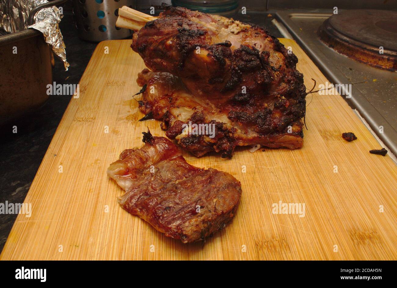 Roast lamb shoulder Stock Photo - Alamy
