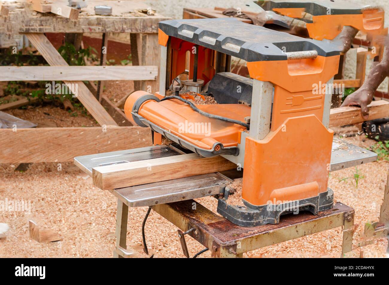 Benchtop Planer At An Angle And Working Wood Stock Photo Alamy