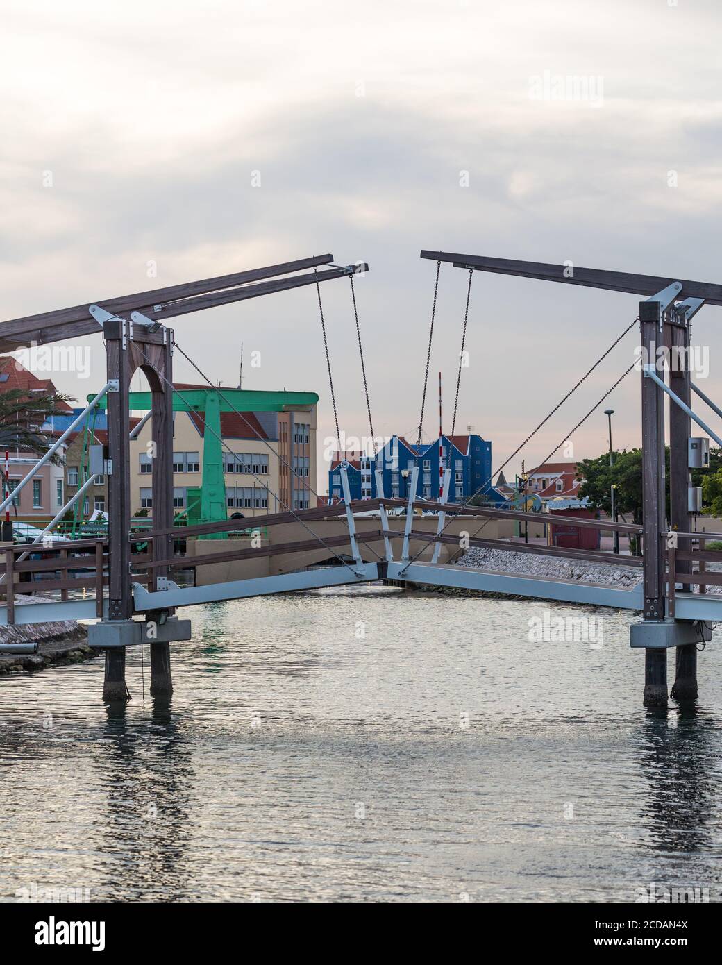 A small pedestrian drawbridge across the Waaigat in the Punda section of Willemstad, the capital of the Caribbean island of Curacao in the Netherlands Stock Photo