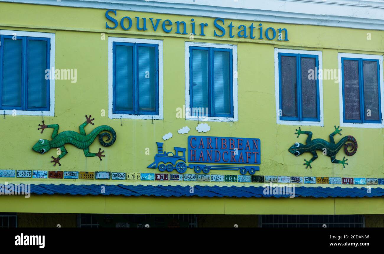 Metal geckos decorate the front of a tourist shop in Punda in Willemstad, the capital of the Caribbean island of Curacao in the Netherlands Antilles. Stock Photo