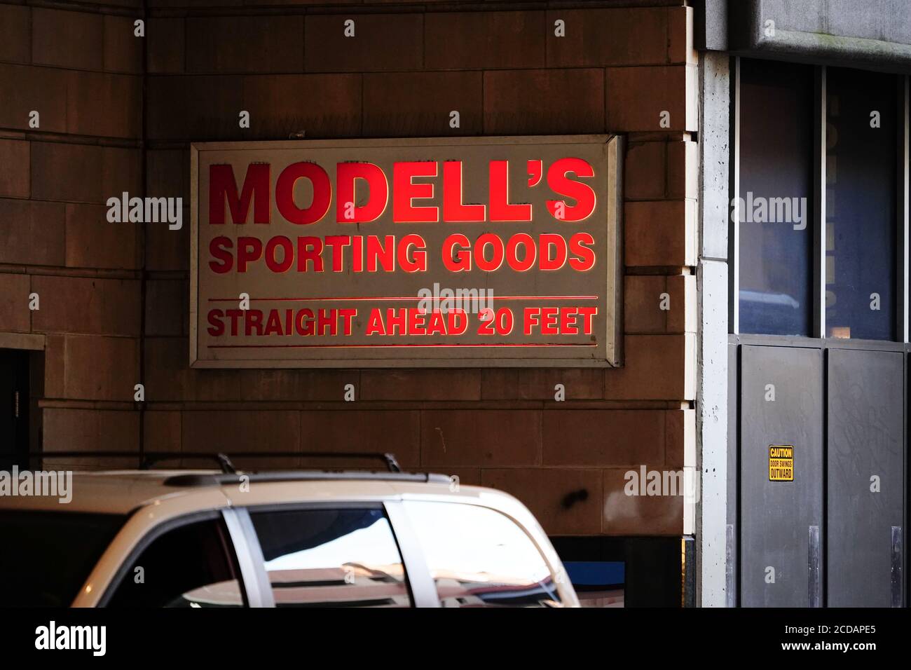 Giants clothing on display at Modell's store in Herald Square, Manhattan.  Giants fans buying clothing now that the team is doing well. Photo Credit:  Mariela Lombard/ ZUMA Press Stock Photo - Alamy