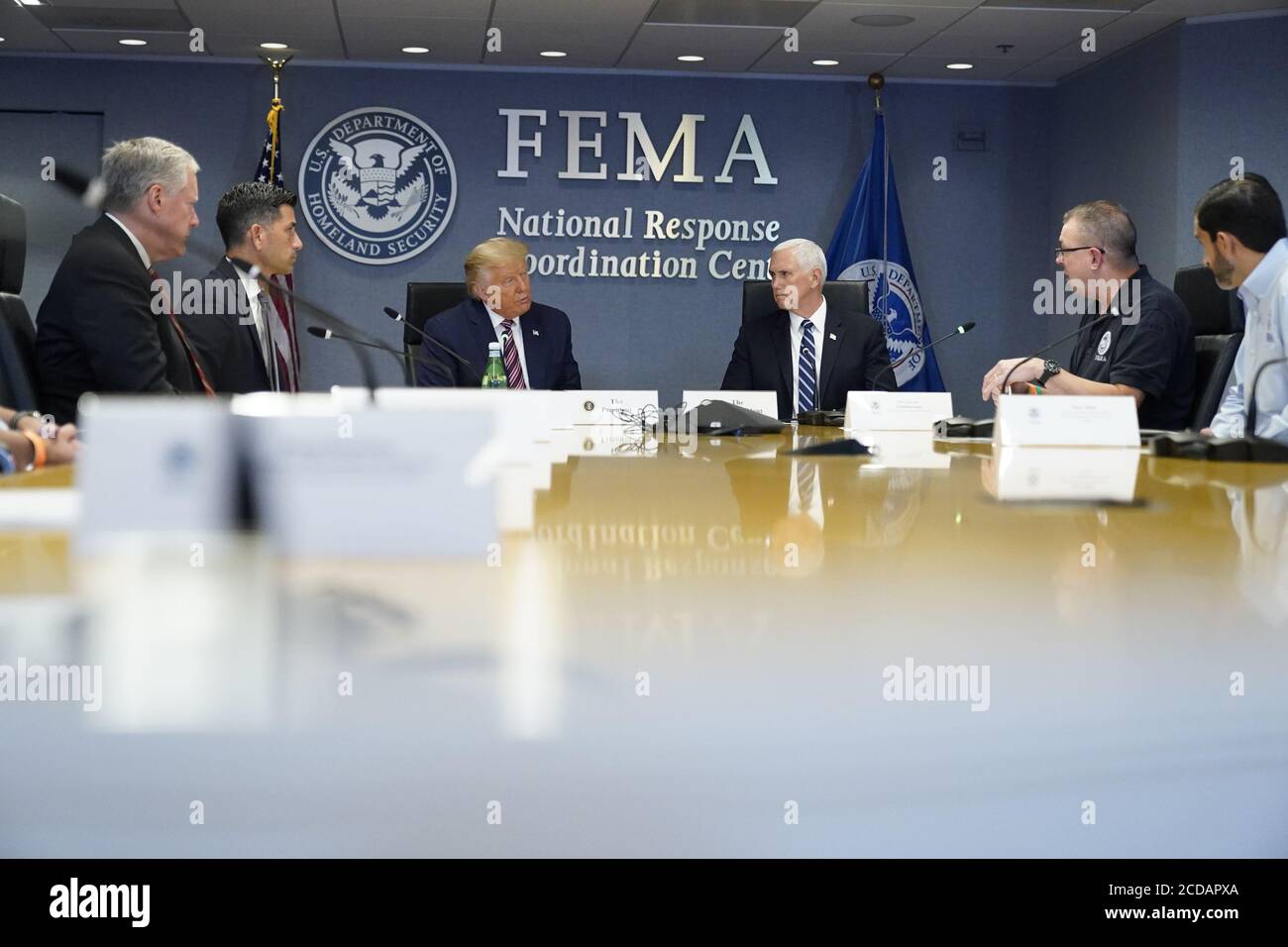 United States President Donald J. Trump and US Vice President Mike Pence visit the Federal Emergency Management Agency (FEMA) headquarters in Washington, DC for a briefing on Hurricane Laura on August 27, 2020. From left to right: Mark Meadows, Assistant to the President and Chief of Staff, acting US Secretary of Homeland Security Chad F. Wolf, US President Donald J. Trump, US Vice President Mike Pence, Pete Gaynor, Administrator, Federal Emergency Management Agency (FEMA).Credit: Erin Scott/Pool via CNP /MediaPunch Stock Photo