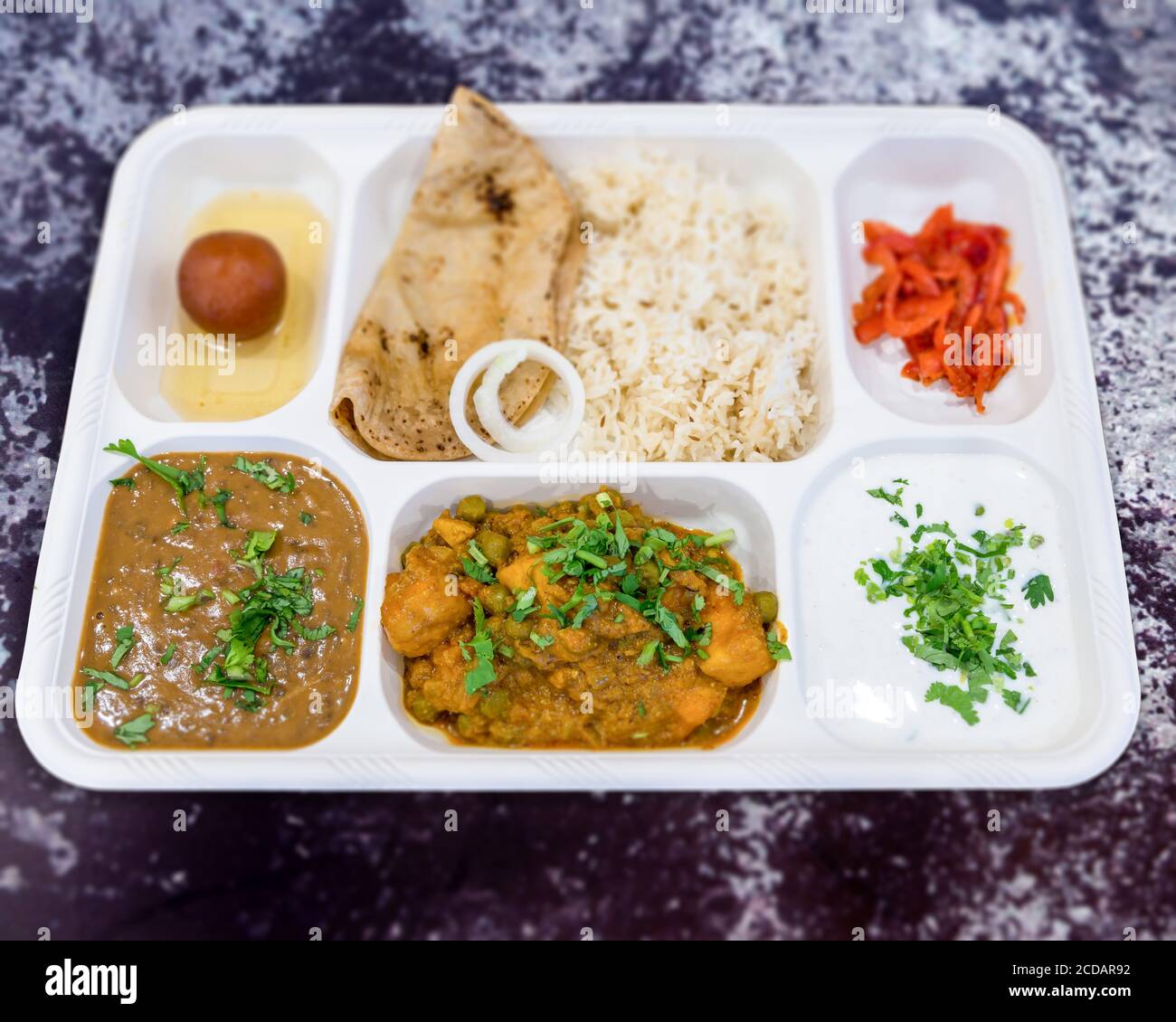 Delicious Vegetarian Thali Lunch in a Tray Stock Photo