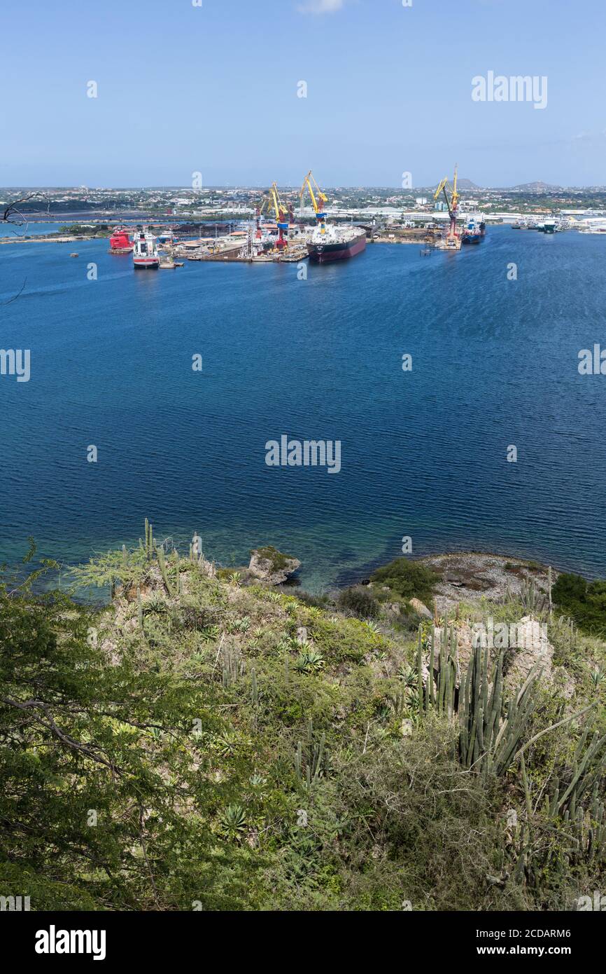 The harbor of Willemstad, capital of the Caribbean island nation of Curacao is in the Schottegat lagoon, a large natural lagoon connected to the ocean Stock Photo