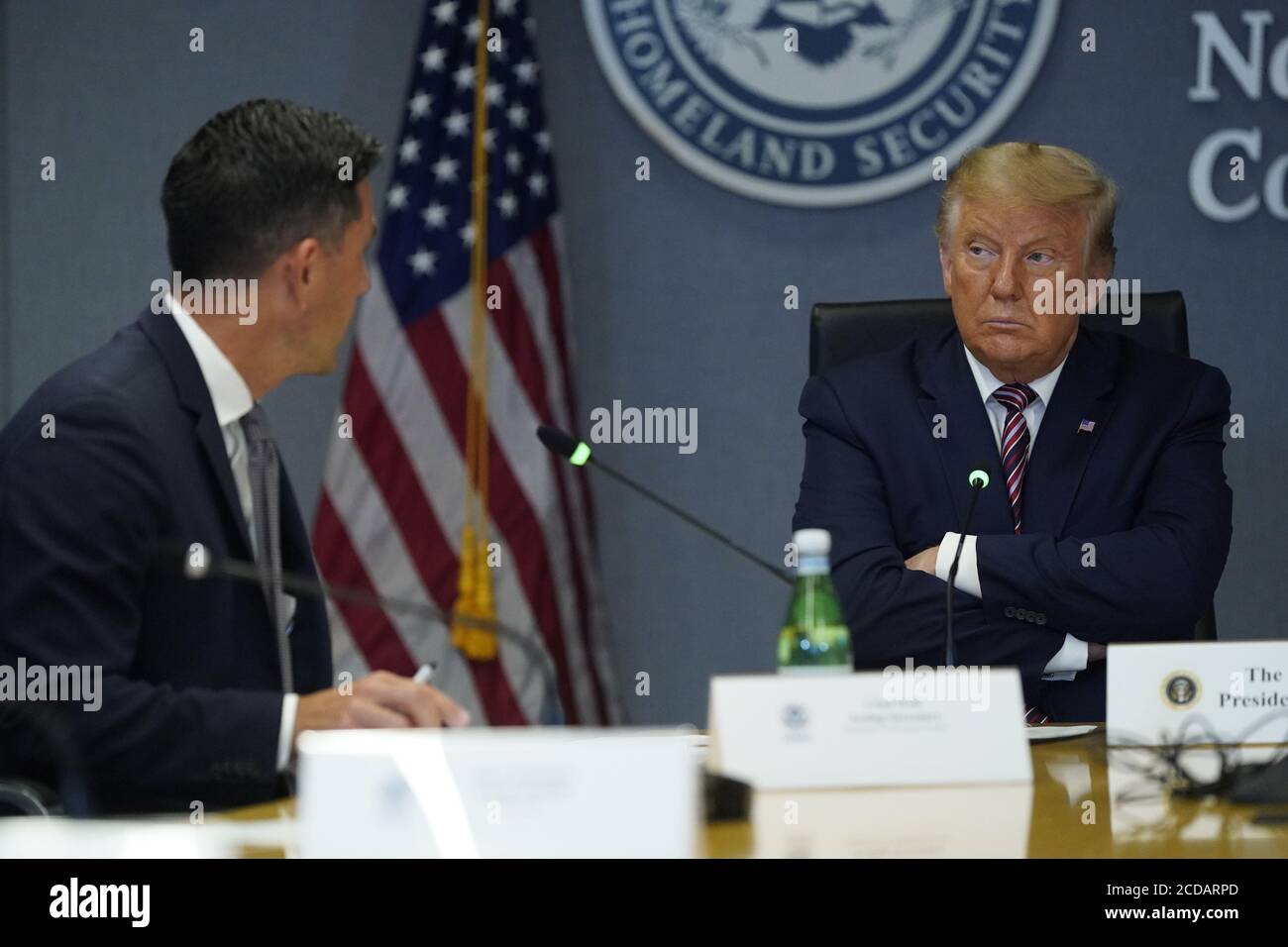 Washington, United States Of America. 27th Aug, 2020. United States President Donald J. Trump listens to acting US Secretary of Homeland Security Chad F. Wolf as he and US Vice President Mike Pence visit the Federal Emergency Management Agency (FEMA) headquarters for a briefing on Hurricane Laura.Credit: Erin Scott/Pool via CNP *** Local Caption *** BSMID5075486 | usage worldwide Credit: dpa/Alamy Live News Stock Photo
