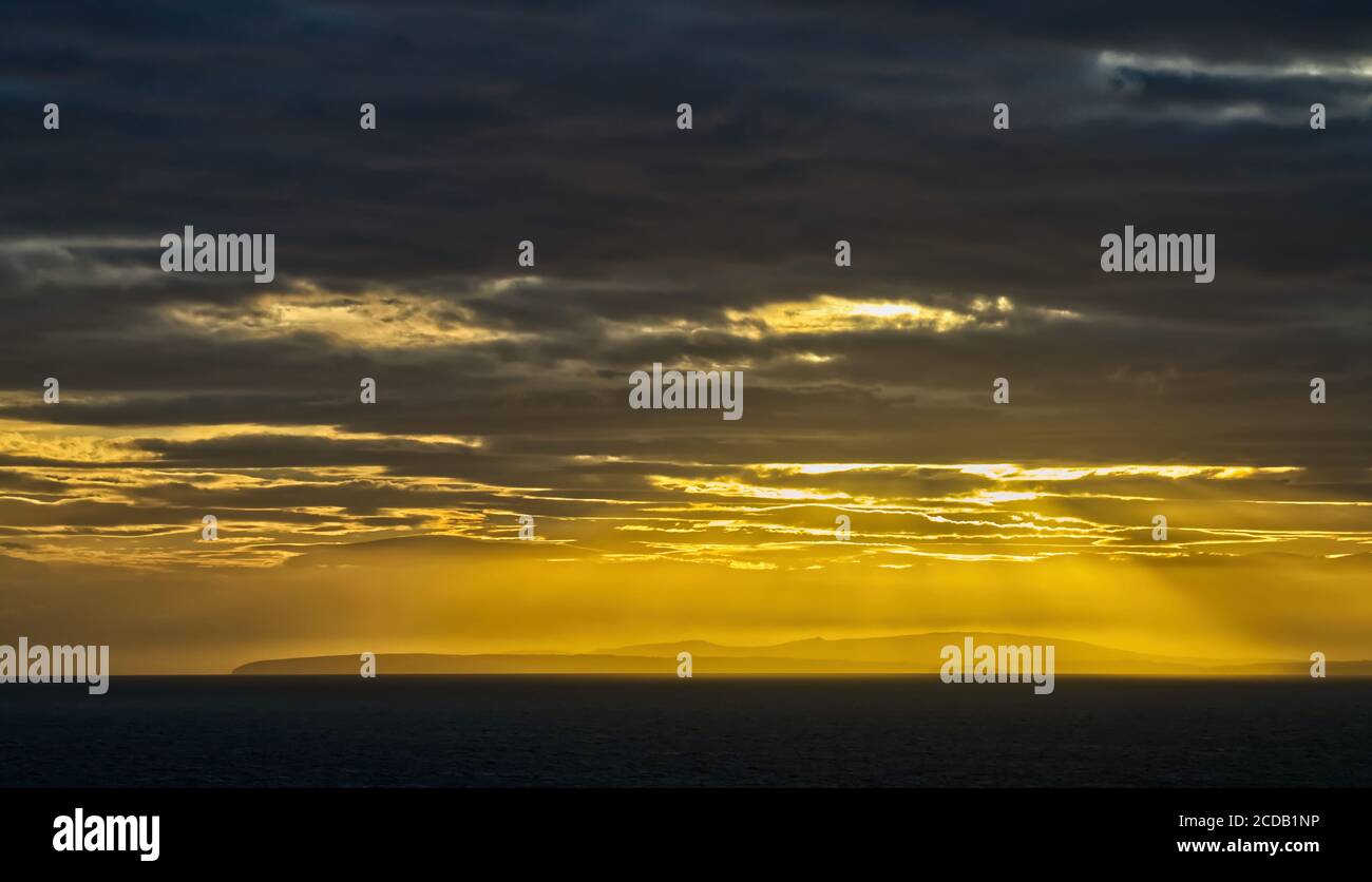 Sunset over north Wales coastline Stock Photo