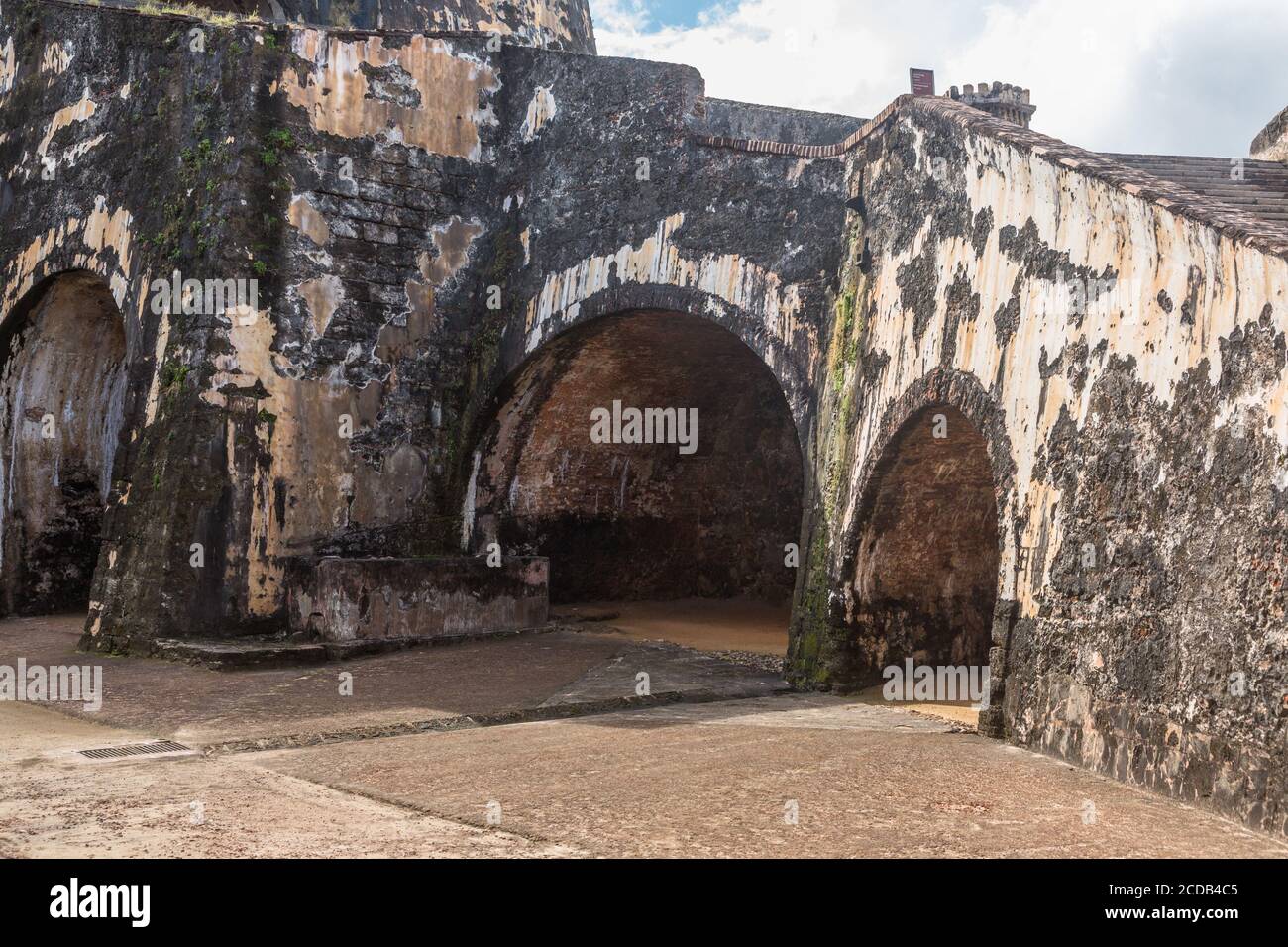 Casemates on the Lower Plaza of Castillo San Felipe del Morro were used for living quarters or to store supplies.  Old San Juan, Puerto Rico.  San Jua Stock Photo