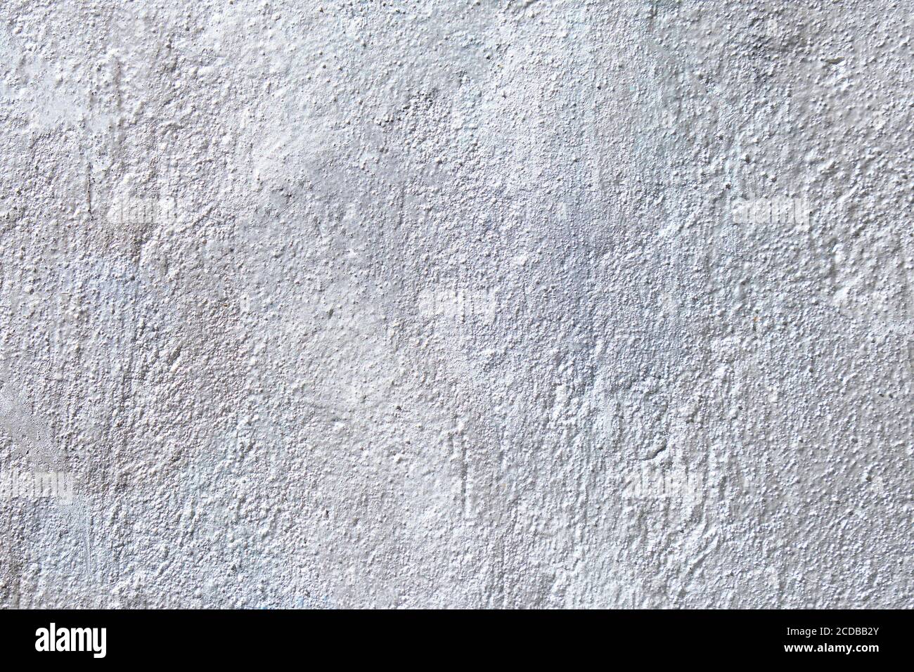 Gray and silver plaster texture on the wall. Stock Photo