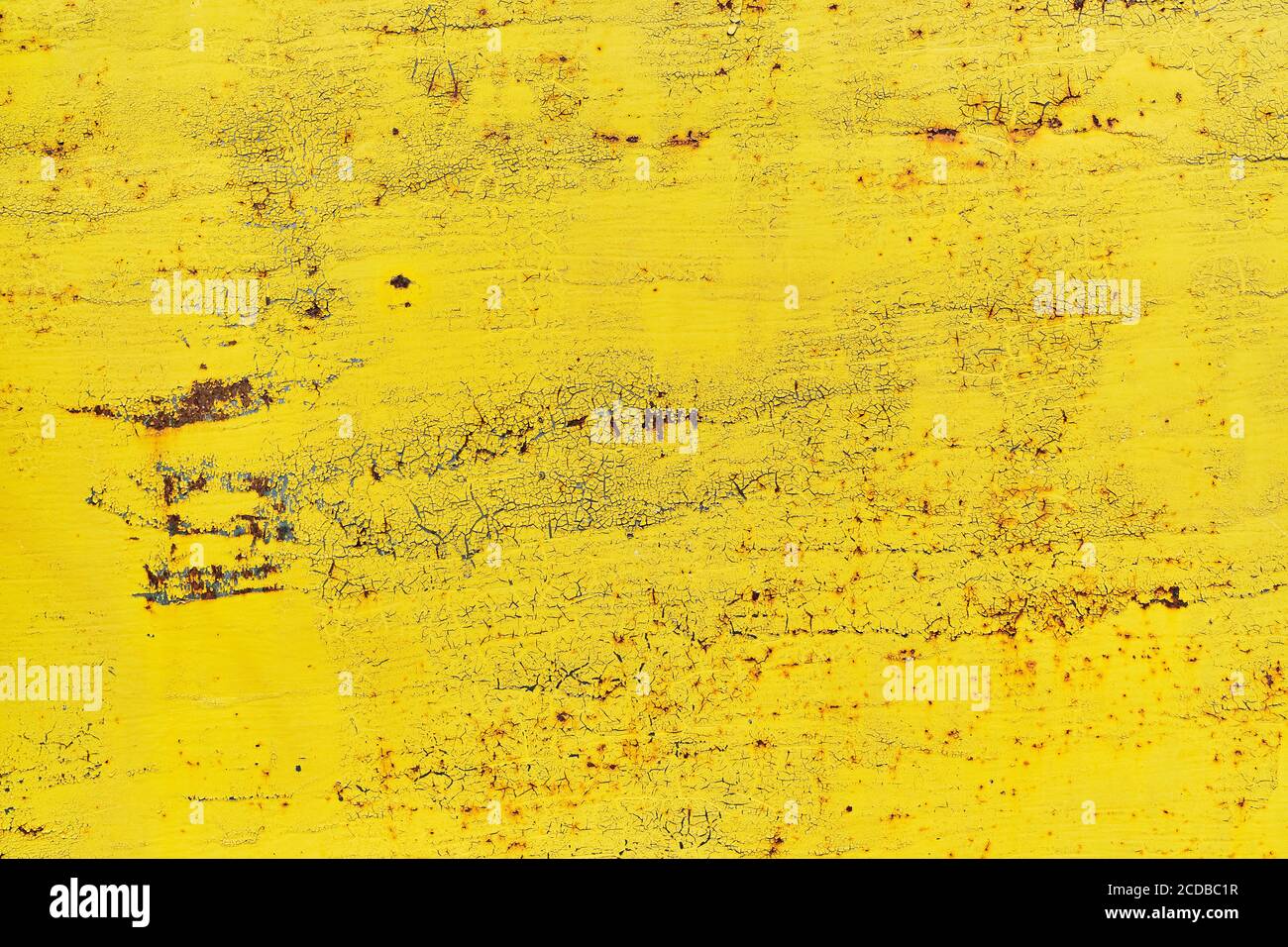 Watercolour background in old vintage yellow paint with cracks Stock