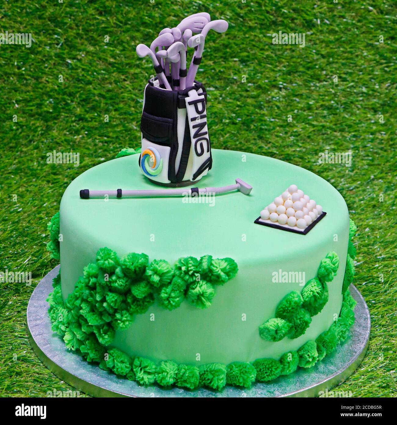 Dubai, United Arab Emirates - August 24, 2020 Designed birthday cake on a  green grass background, Golf theme Stock Photo - Alamy