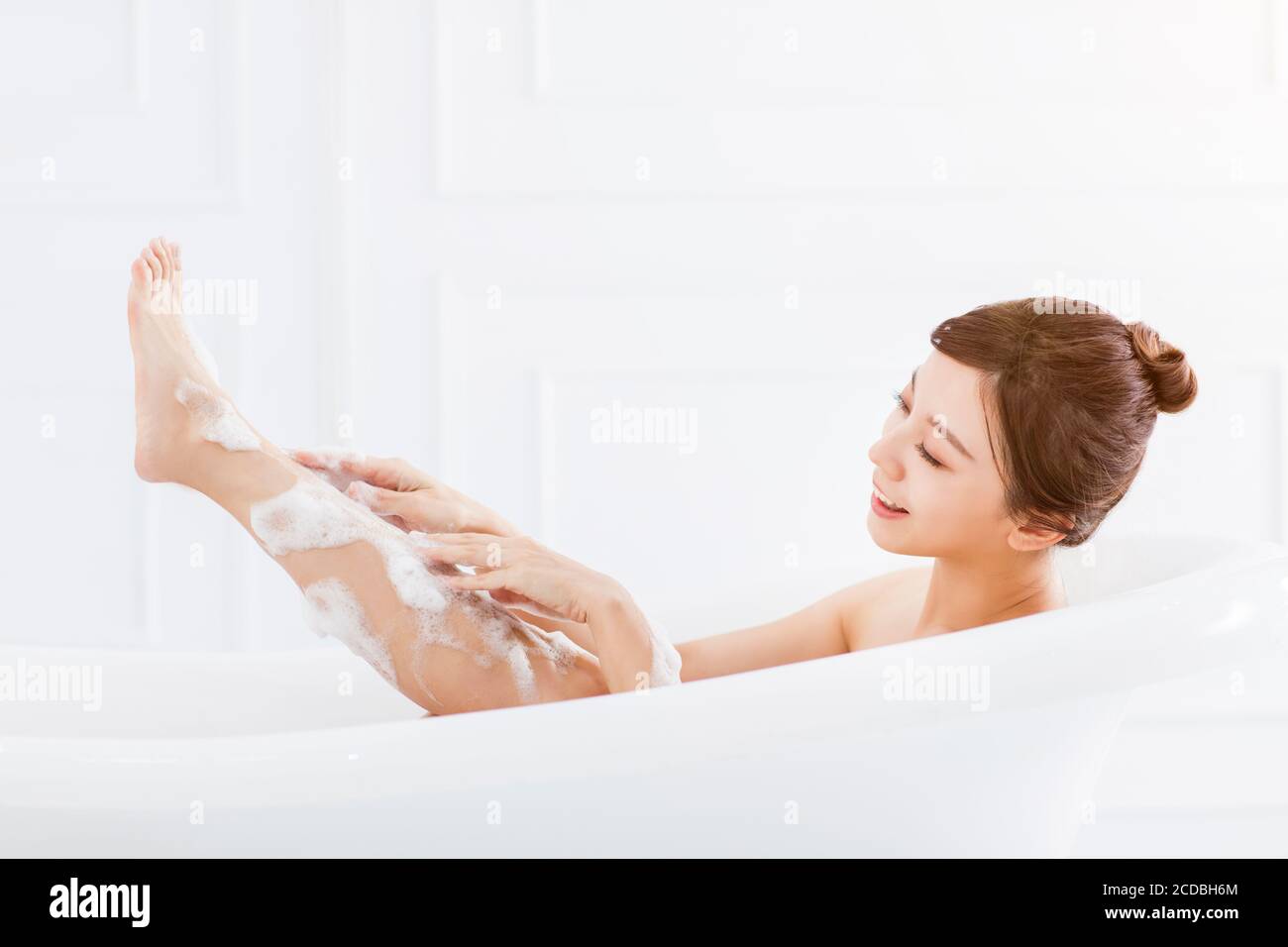 young woman take a bath in bathtub Stock Photo Alamy