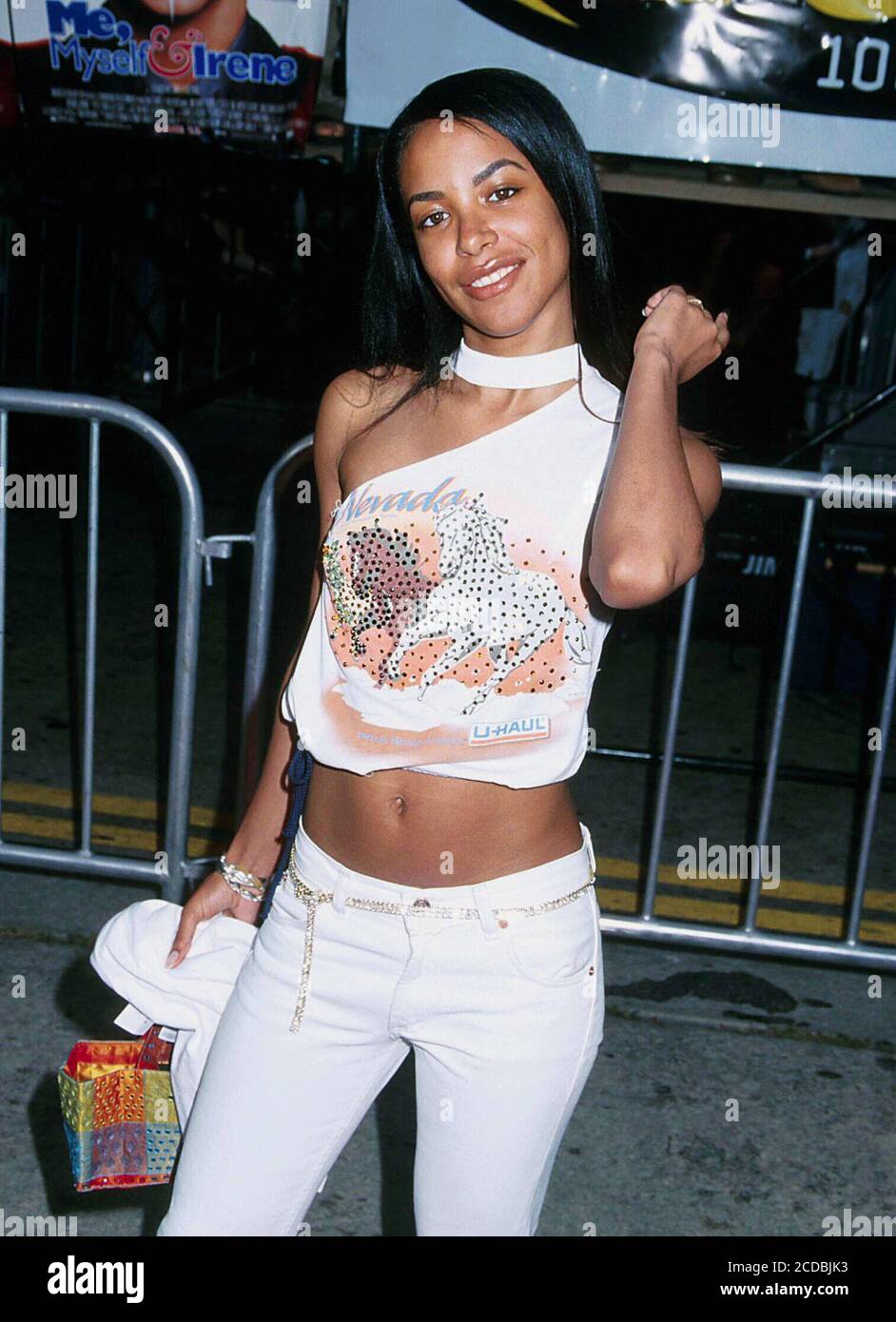 15 Jun 2000, Westwood, Los Angeles, California, USA --- Aaliyah at the premiere of Me, Myself and Irene. --- ' Tsuni / USA 'Aaliyah 223 Aaliyah 223 Celebrities fashion / Three Quarters from the Red Carpet-1994-2000, one person, Vertical, Best of, Hollywood Life, Event in Hollywood Life - California,  Red Carpet Event, Vertical, USA, Film Industry, Celebrities,  Photography, Bestof, Arts Culture and Entertainment, , , Topix   Aaliyah 223 Event in Hollywood Life - California,  Red Carpet Event, Vertical, USA, Film Industry, Celebrities,  Photography, Bestof, Arts Culture and Entertainment, , , T Stock Photo