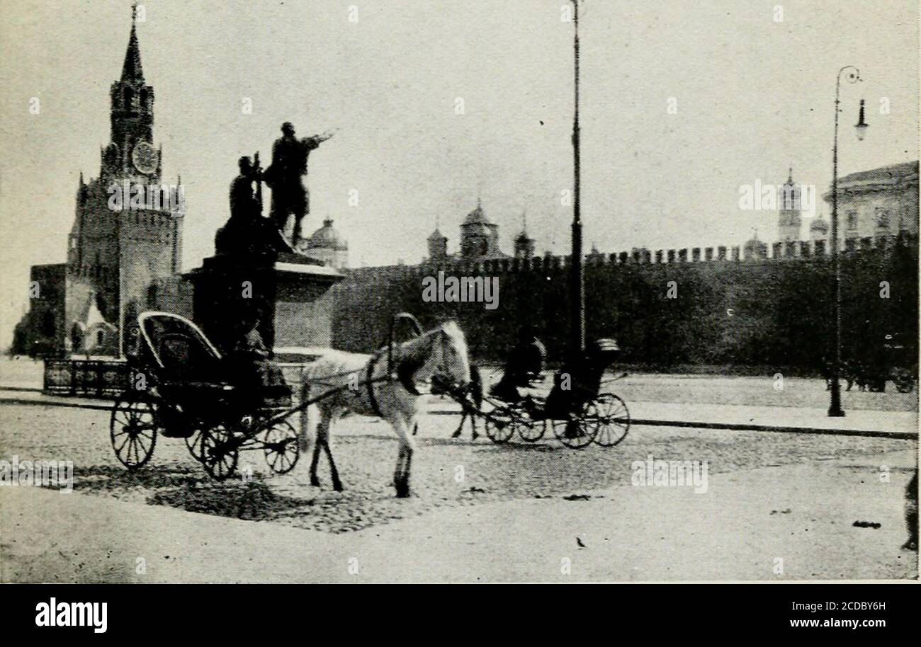. Real Russians . A Country Road.. The Cobble Pavement of Moscow. Face p. 40. THE WORST OF RUSSIAN ROADS. 41 At the station a crowd of peasants was clusteringround an old man who was selling birch-bark shoes. Do you know that rich ladies are now beginningto wear such shoes ? I said to the pedlar : boots aregetting so dear, and these ladies wish to set a goodexample. What next ? said the old man, quite distressed ; if ladies are wearing bark shoes their price will go up,and what will the poor moujik do then for footgear ? In Moscow we had to drive across the town fromone station to the other. W Stock Photo