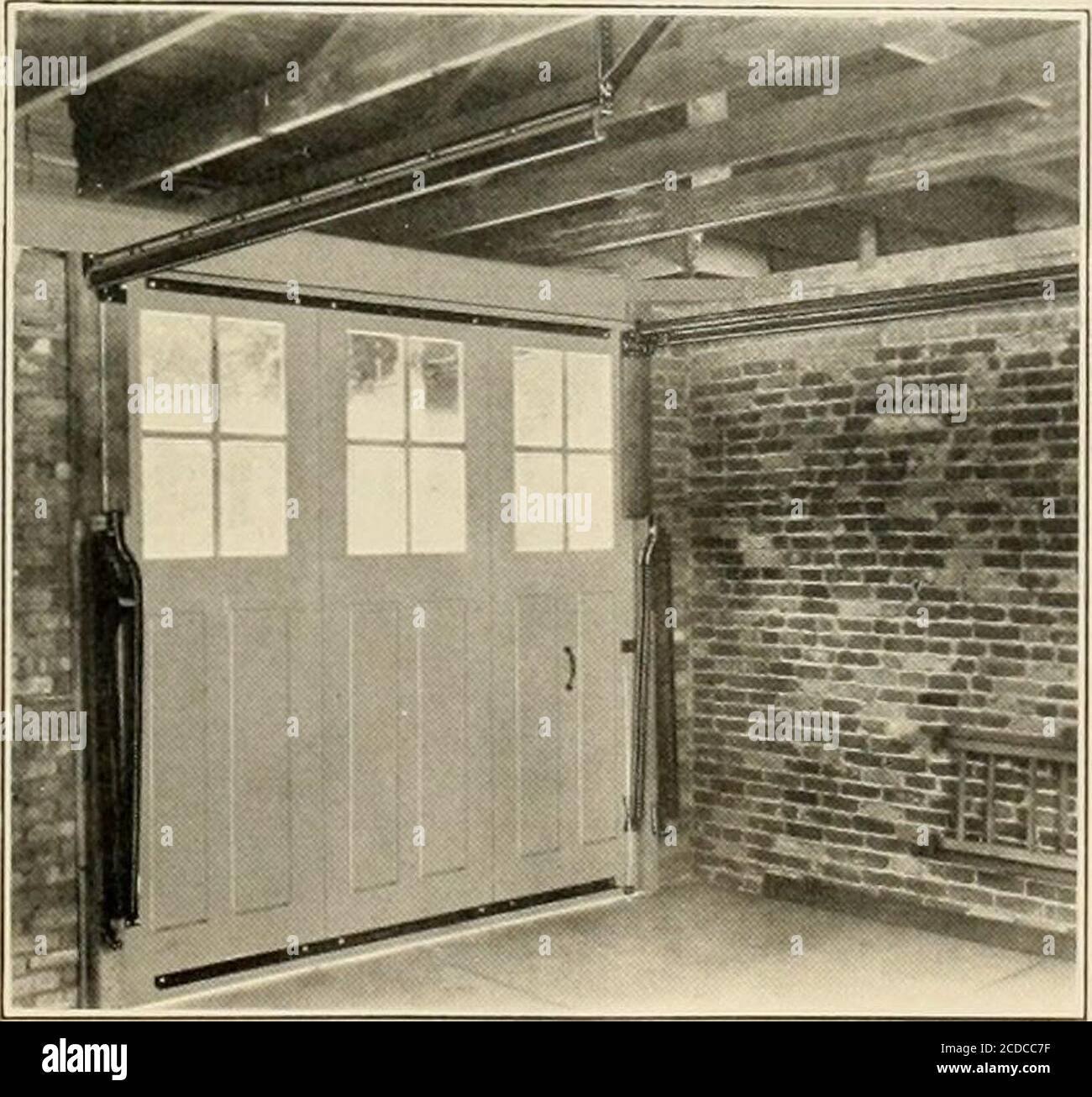 Over The Top Door Equipment For Operating Vertical Doors Overhead Mechanical Parts Are The Simplestpossible Consistent With Long Satisfactory Service Note Theabsence Of Weights Cables Andexcessive Trackage Method Of Installing Overheadtrack Over The Top Door Equipment For Operating Vertical Doors Overhead Mechanical Parts Are The Simplestpossible Consistent With Long Satisfactory Service Note Theabsence Of Weights Cables Andexcessive Trackage Method Of Installing Overheadtrack