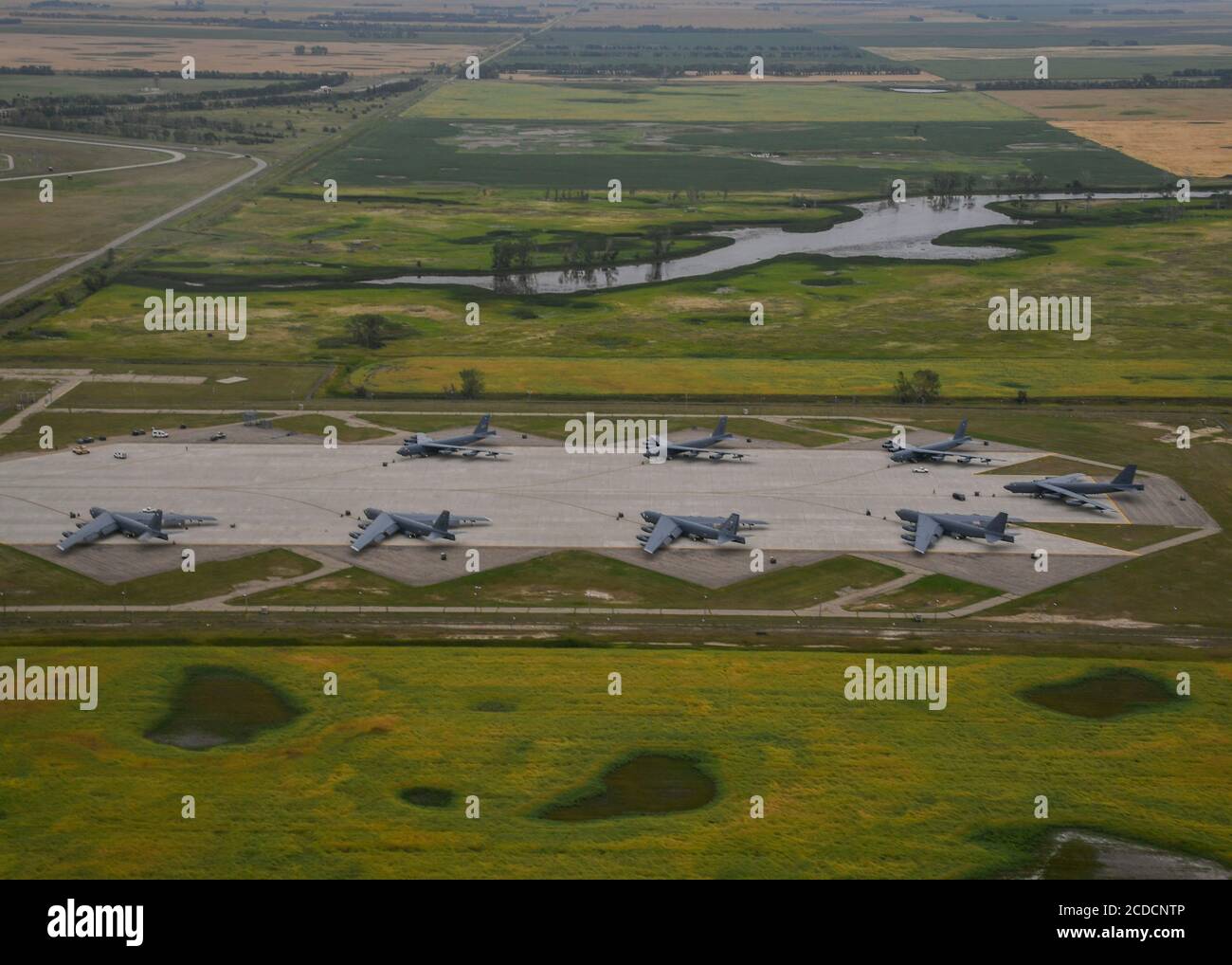 B-52H Stratofortresses from Barksdale Air Force Base, Louisiana, sit at the airfield, Aug. 27, 2020, at Minot Air Force Base, North Dakota. The 2nd Bomb Wing bombers relocated to Minot AFB, N.D. to ensure the United States' ability to conduct long range precision strike is not impacted. (U.S. Air Force photo by Airman First Class Caleb Kimmell) Stock Photo