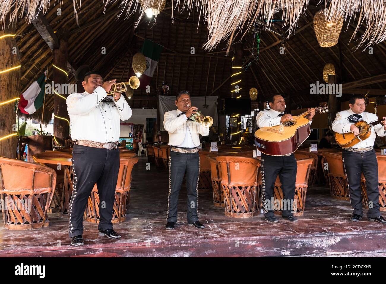 A Mariachi band performs at a restaurant in Tulum, Mexico Stock Photo ...