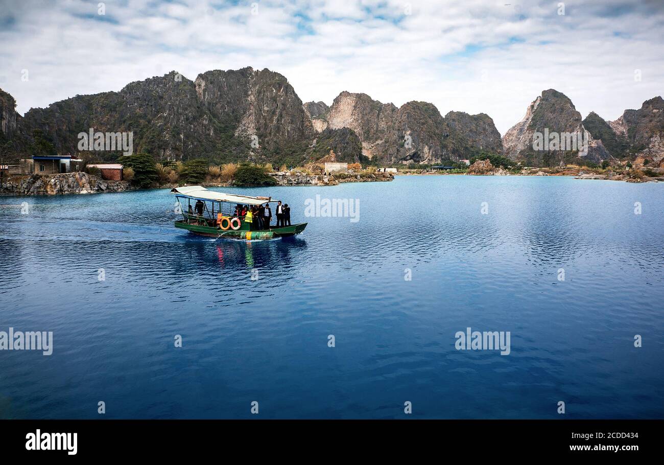 Clear blue lake, suburban Hai Phong, Vietnam Stock Photo