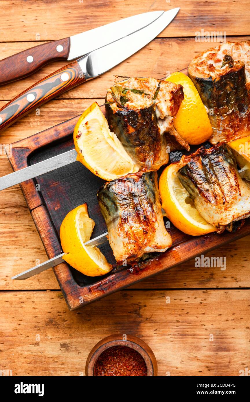 Grilled skewers of mackerel with lemon.Grilled fish kebab Stock Photo