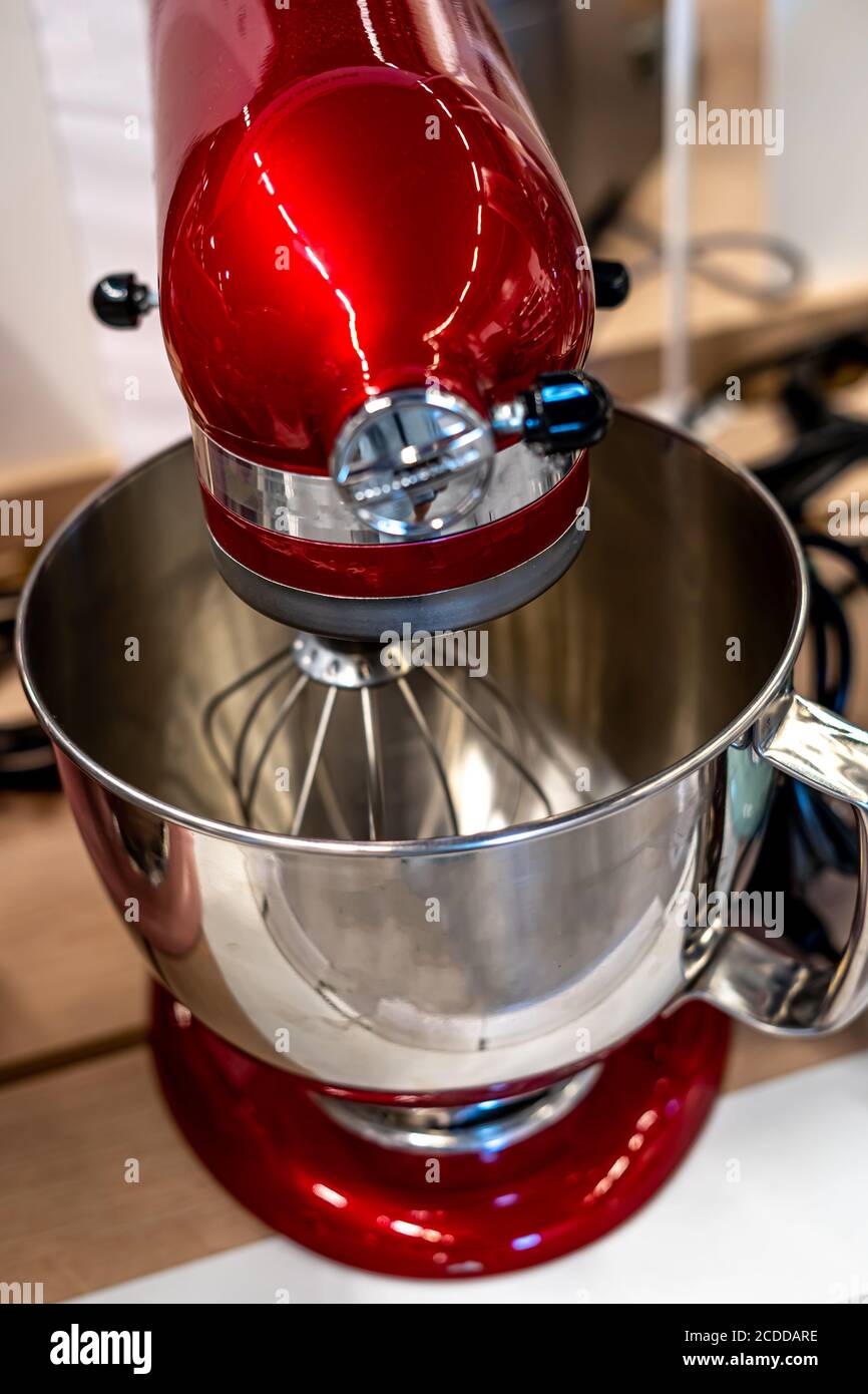 https://c8.alamy.com/comp/2CDDARE/stainless-steel-red-electric-mixer-hand-or-stand-mixer-kitchen-device-selective-focus-macro-close-up-2CDDARE.jpg