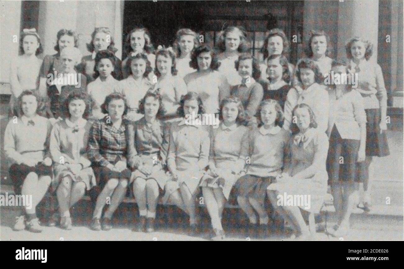 . U and I . i a ;.- Forty. BOTTOM ROW—Mary Helen Kane, Jean Johnston, Helen Kaiser, Beulah Barham, DoloresOvermeyer, Jean Hannagan, Frances Willis, Patricia Price. SECOND ROW—Airs. Wilson, Mabel Chavis, Barbra Schlorff, Betty Cogswell, HelenAnthony, Shirley Davis, Horlense Brigham, Mary Lou Warmouth, Katherine Hutch-inson. THIRD ROW—Anne Louthan, Frances Potts, Mildred Erickson, Elinor Case, TheresaHannagan, Shirley Howard, Nancy Flcisher, Mary Herbert, Arlene Castle. Red Cross The different projects undertaken by members ofthe Red Cross activity included knitting sweaters, knit-ting squares f Stock Photo