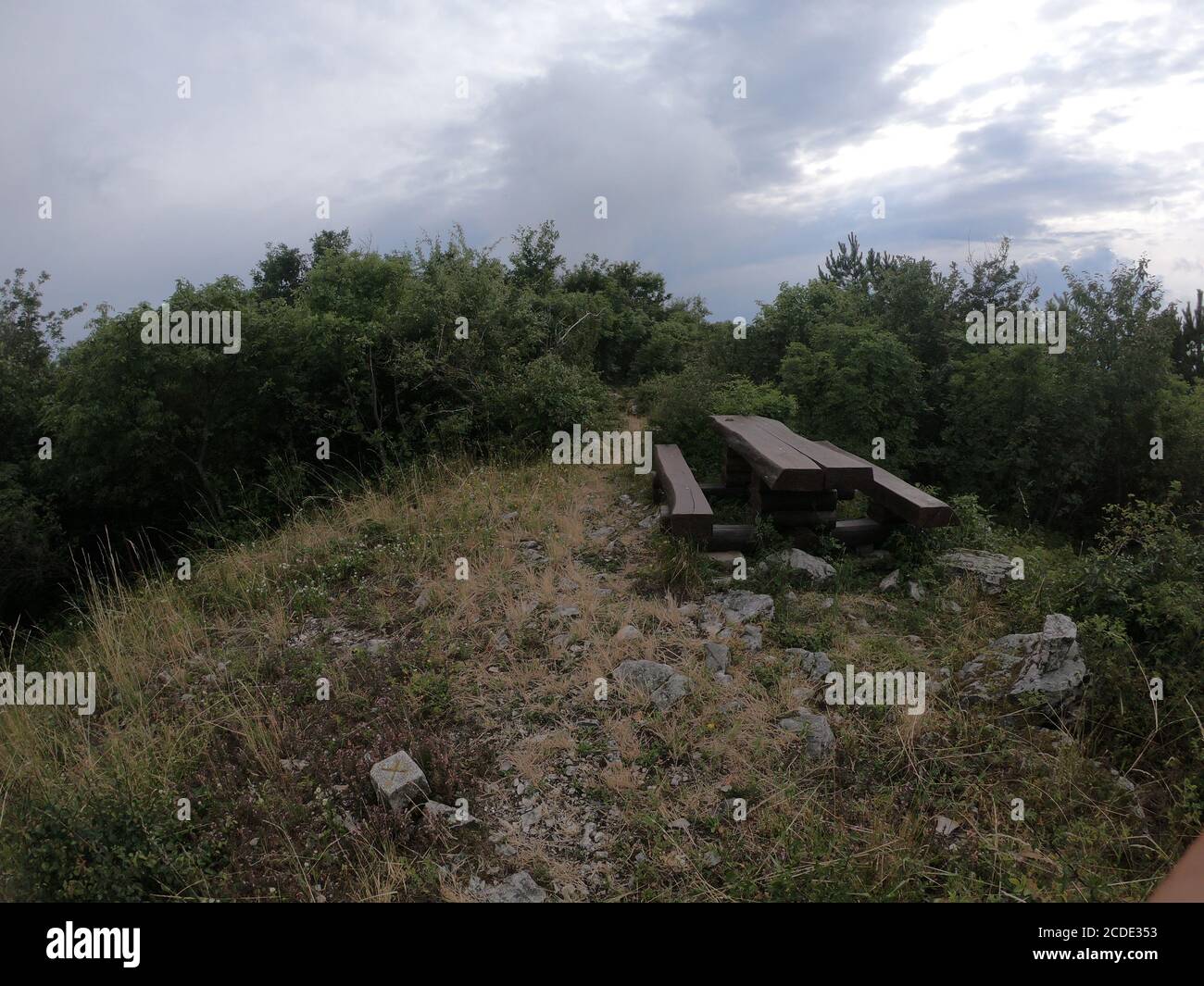 Closeup shot of a rocky hill under a foggy sky at daytime Stock Photo ...