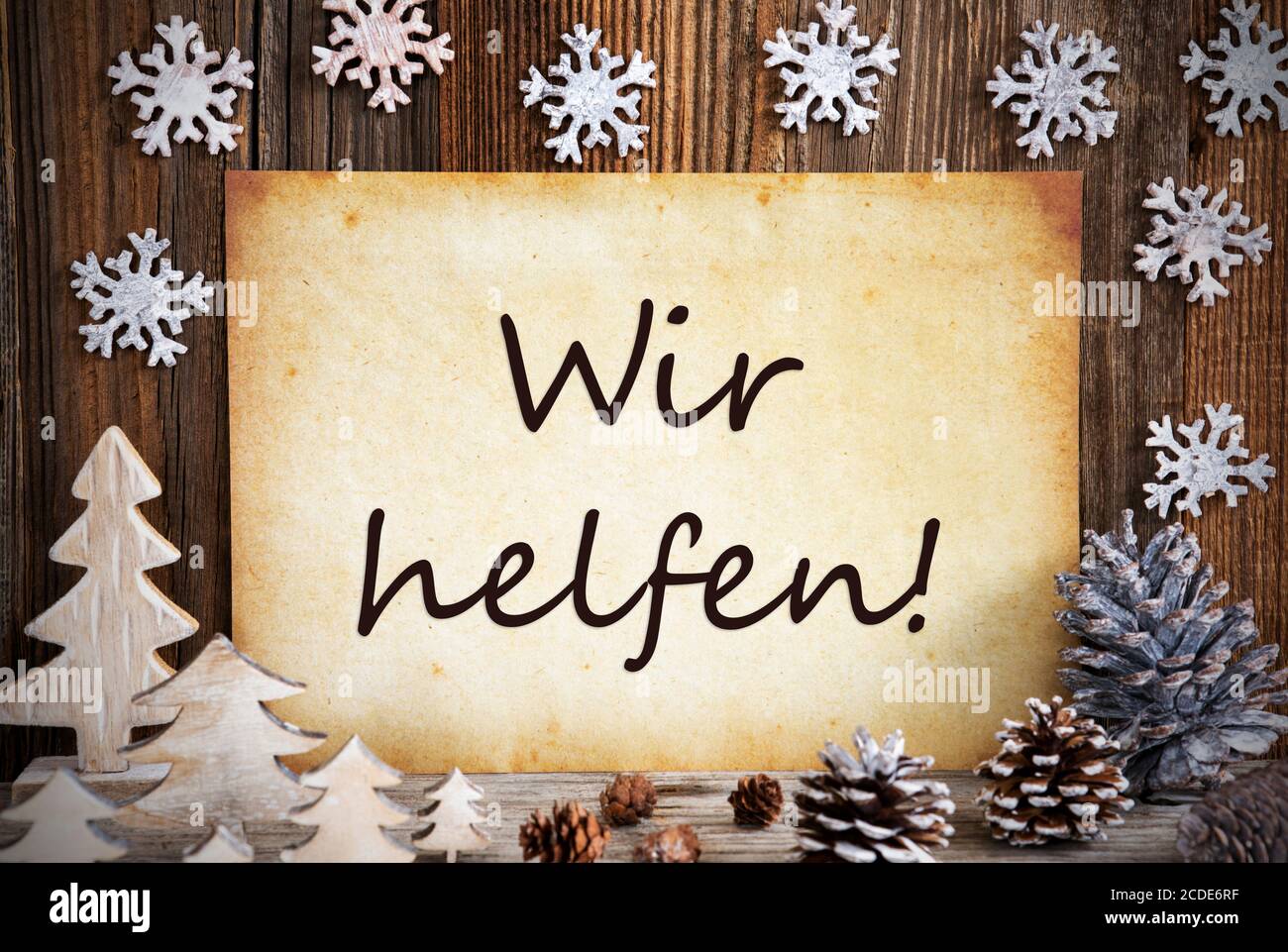 Old Paper, Christmas Decoration, Wir Helfen Means We Help Stock Photo