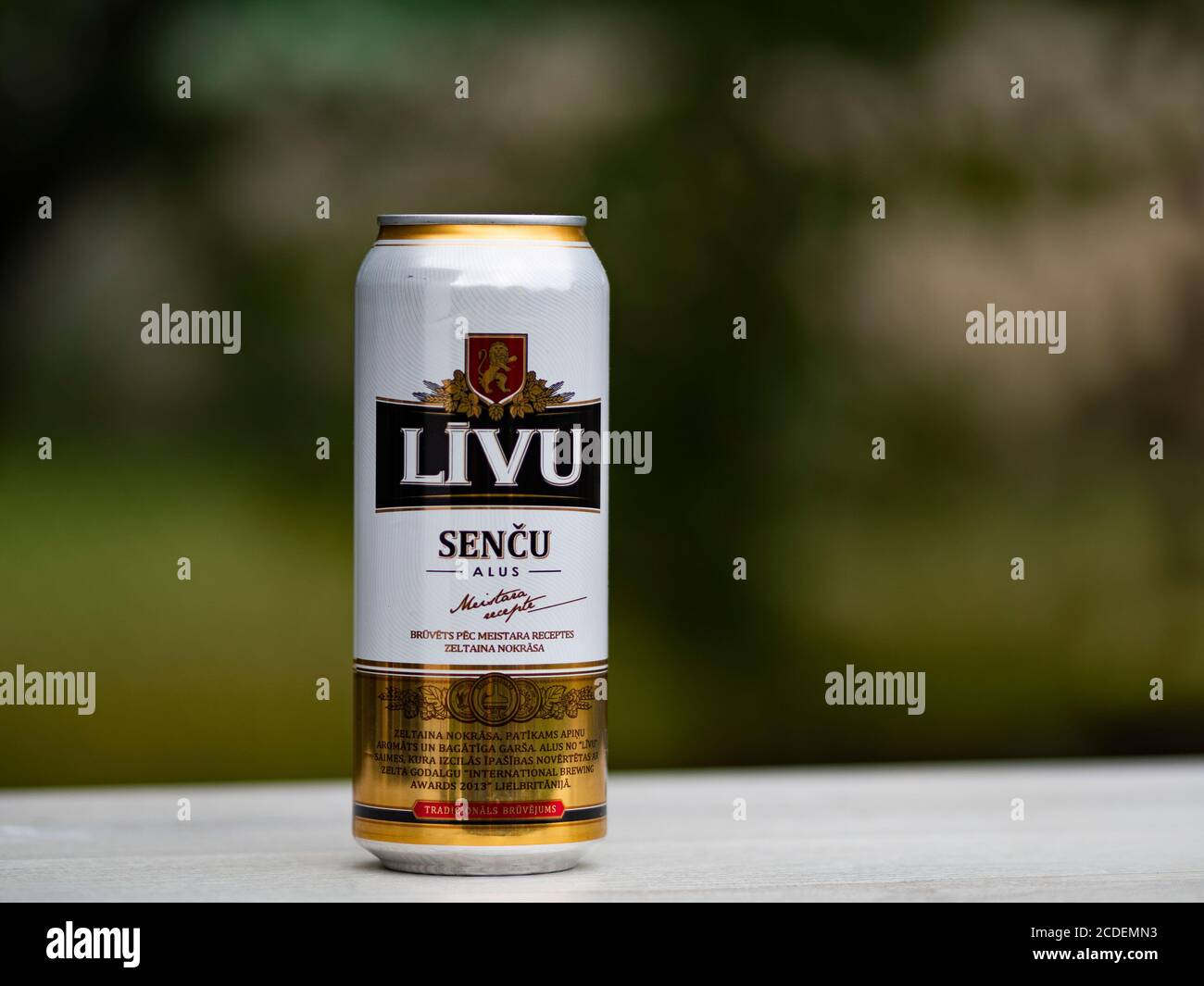In this photo illustrations Livu Sengu Alus beer can seen outdoor. Formally, the beer 'Livu' is Latvian, but since the Livu brewery does not have its own line for filling beer into a can, all canned products are produced and bottled in Lithuania at the Kalnapilio-Tauro Grupe brewery in the city of Panevezys. Stock Photo