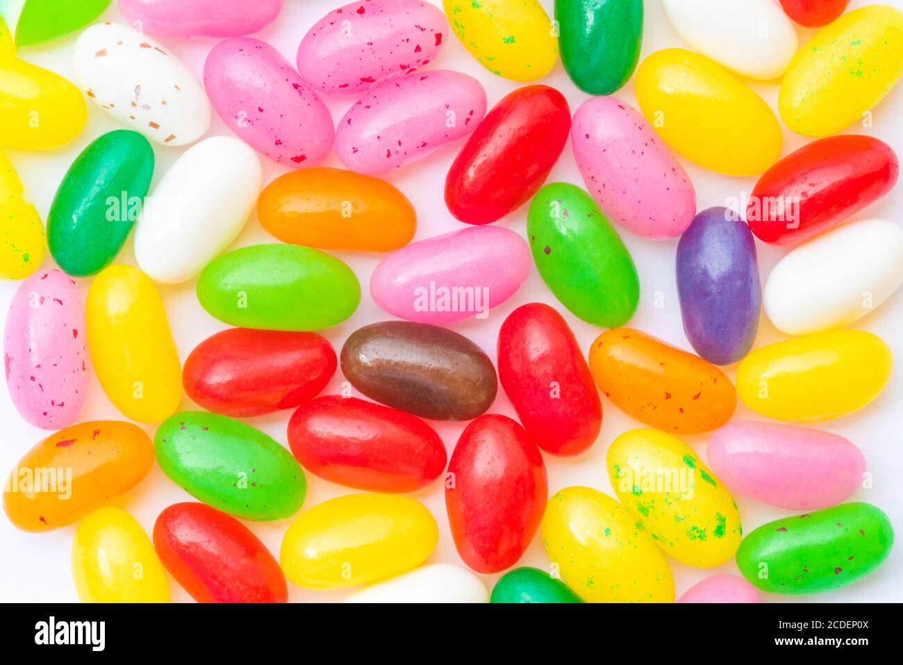 Colorful candies on a white background as colored background Stock Photo