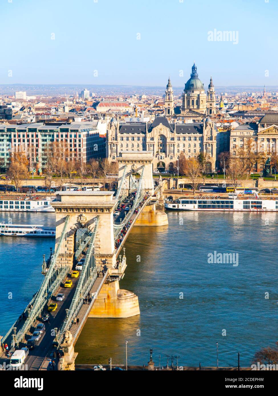 Famous Chain Bridge over Danube River, Gresham Palace and Saint Stephen's Basilica view from Buda Castle on sunny autumn day in Budapest, capital city of Hungary, Europe. UNESCO World Heritage Site Stock Photo