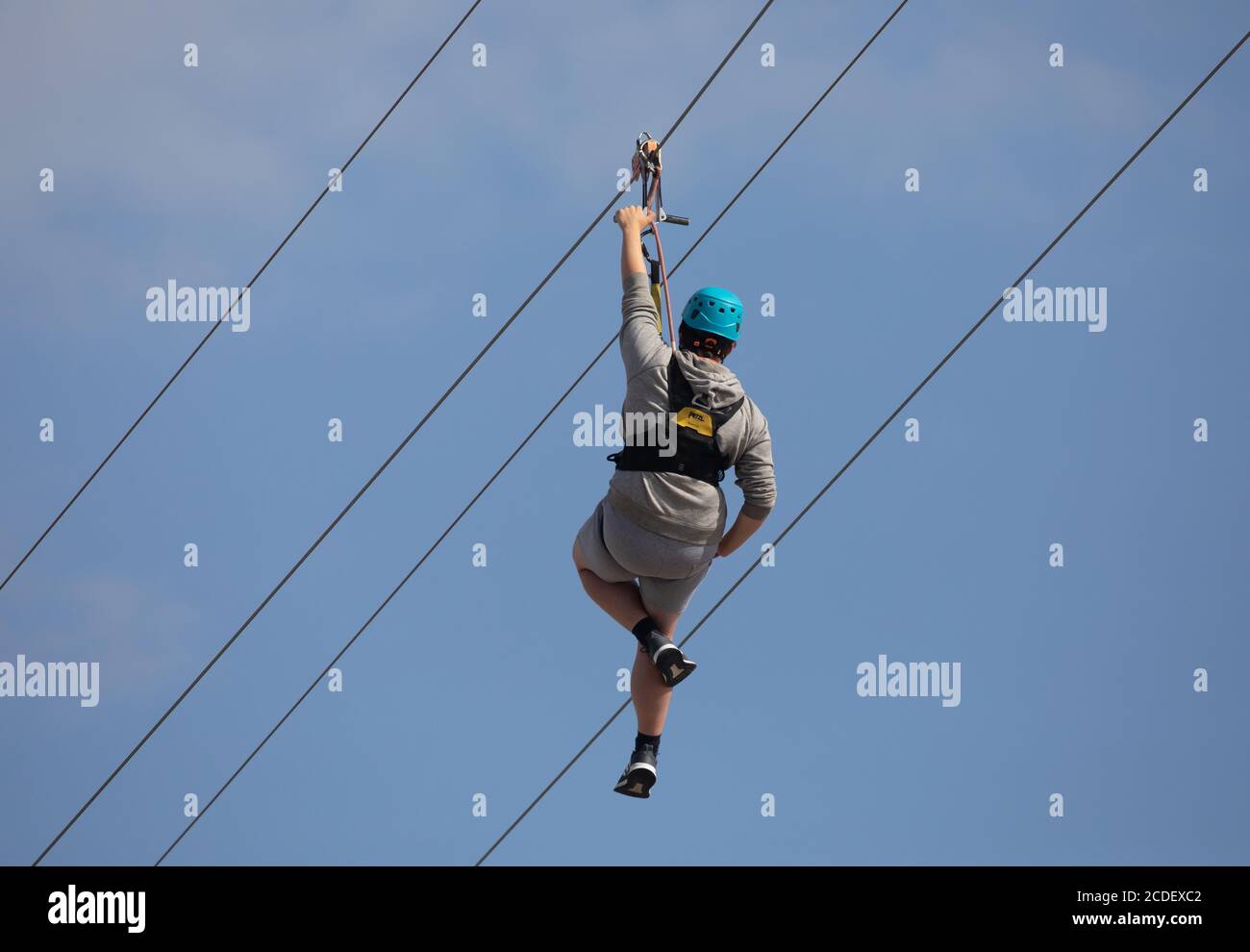 People Ride The Zip Wire In Brighton, East Sussex, Uk Stock Photo - Alamy