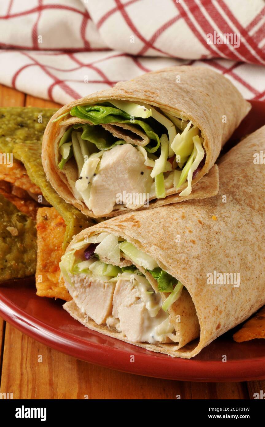 Chicken salad wraps with vegetable tortilla chips Stock Photo Alamy