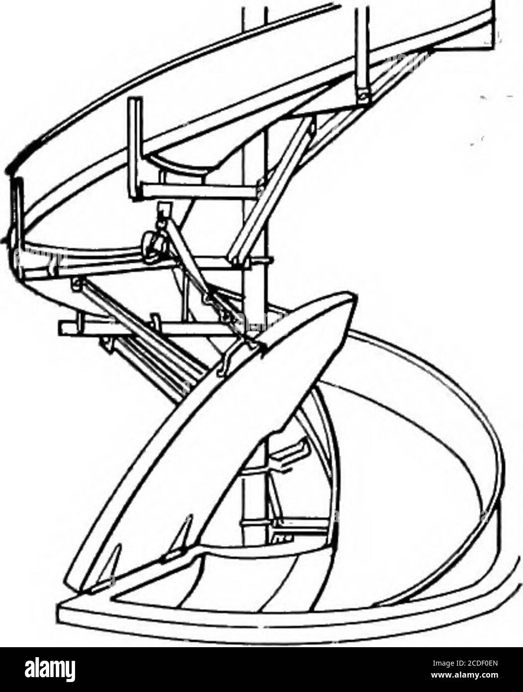 . Material handling cyclopedia; a reference book covering definitions, descriptions, illustrations and methods of use of material handling machines employed in industry . Figs. 159 and 160 panel which is normally supported by a chain and fusiblelink but is free to slide in vertical steel guides. When thisdoor is closed it fits snugly into the chute and effectivelycloses off all connection between floors. On multiple blade spiral chutes it is often found thatsufficient clearance is not available between the blades toallow of the application of a vertical sliding fire door. Inthis case a roller Stock Photo