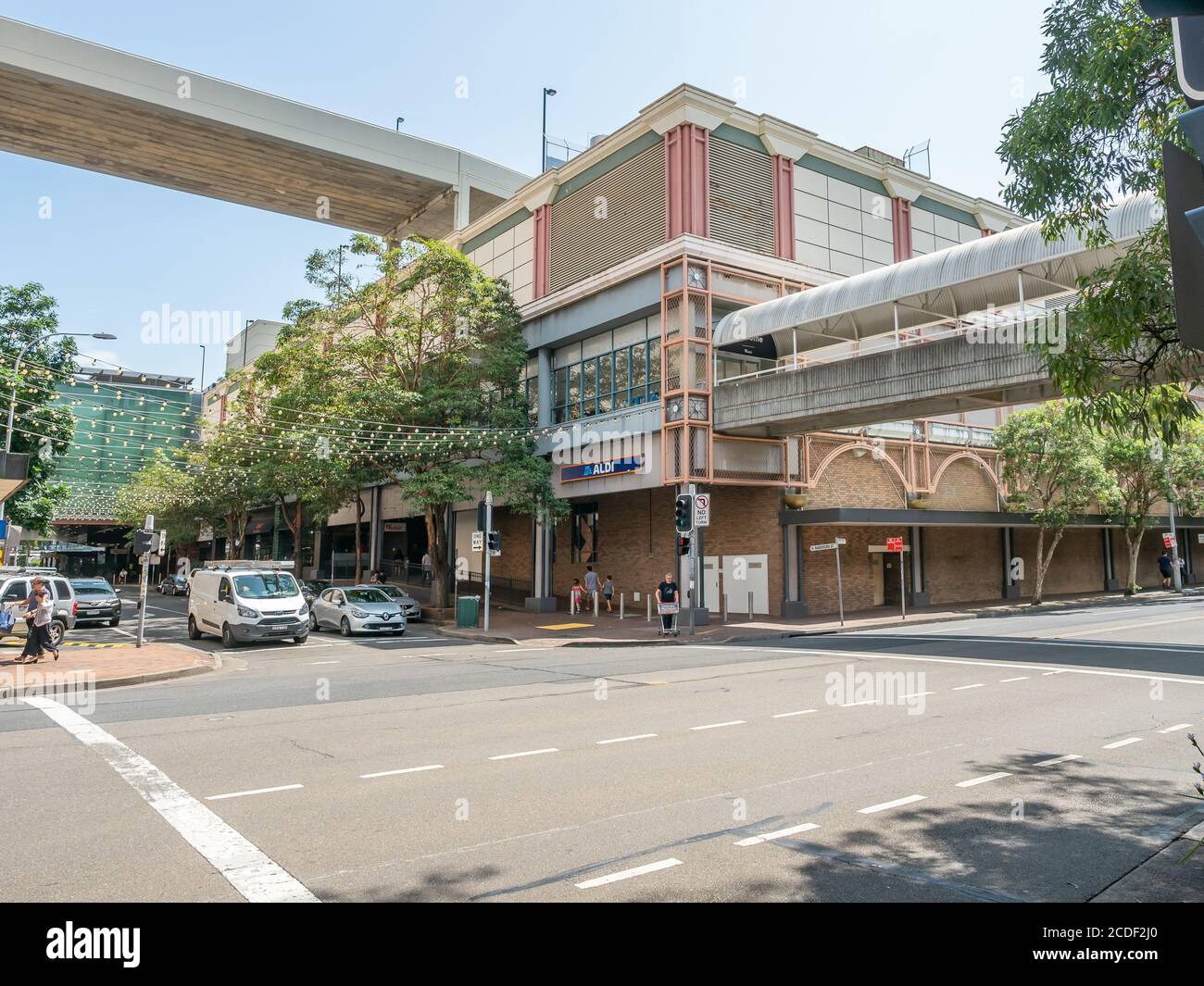 View of a Street in Chatswood Suburb in Lower North Shore and Pedestrian Bridge connecting Westfield Shopping and Car Park on sunny summer afternoon Stock Photo