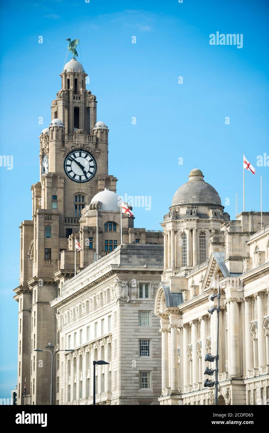 View of iconic grand old waterfront buildings, the three graces, at the Pier Head in Liverpool, UK Stock Photo