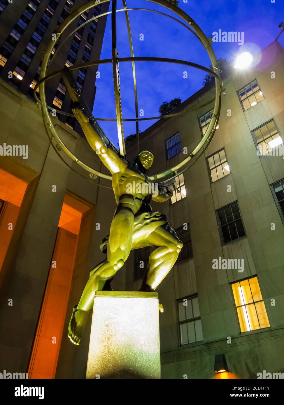 Atlas, a bronze statue in the Rockefeller Center, within the International Building's courtyard, Midtown Manhattan, New York City, New York, USA Stock Photo