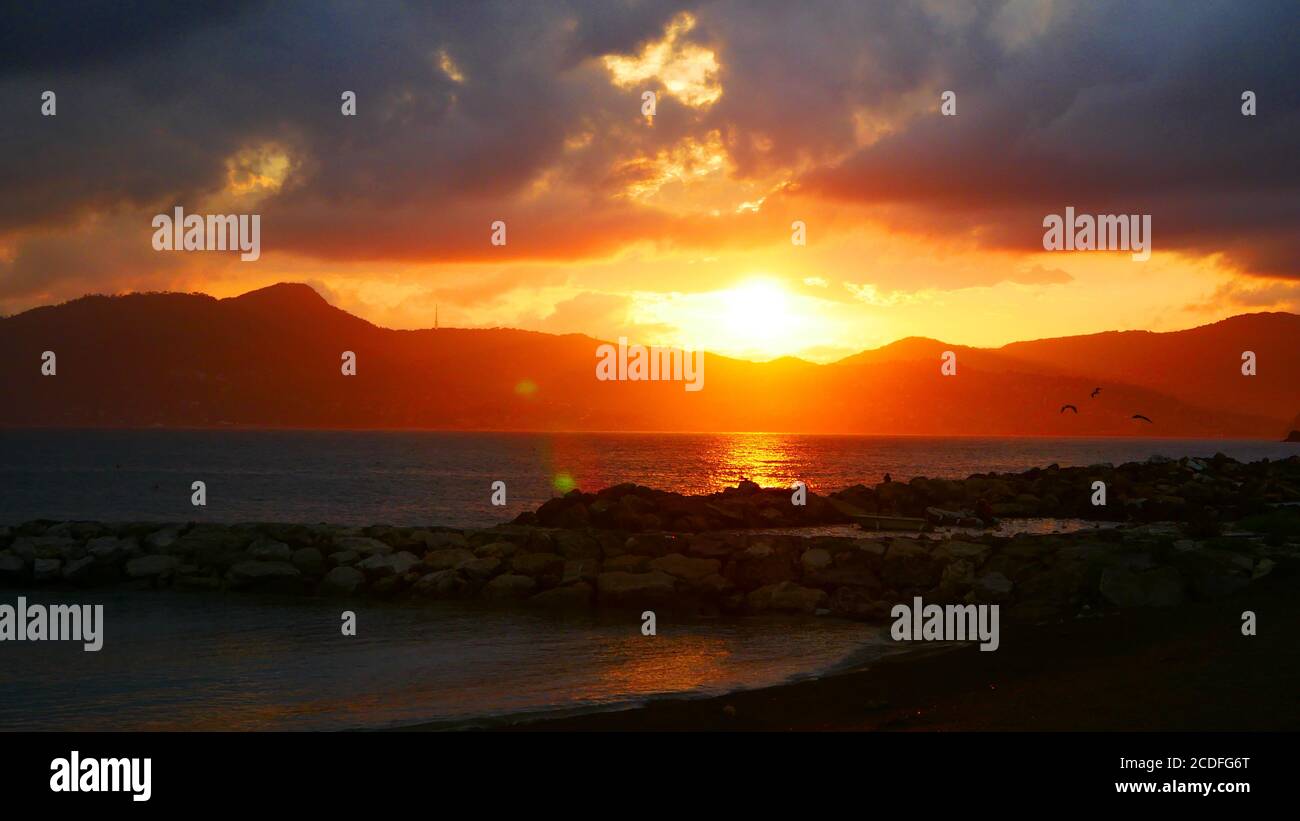 Chiavari, Italy: Sunset over the sea Stock Photo
