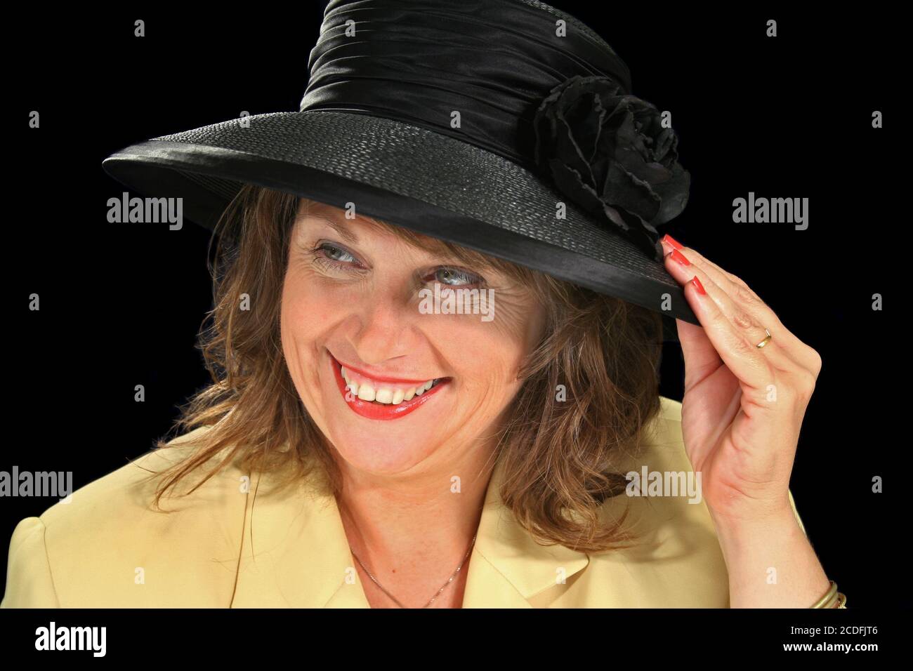 Laughing girl with black hat hi-res stock photography and images - Alamy