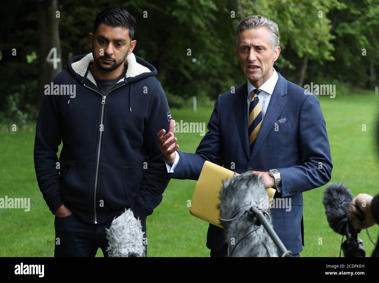 Sadat Ahmed brother of Samia Ahmed alongside Detective Superintendent Martin MacLean(r) as they speak to the media at Gogarburn Golf Course, Newbridge, Edinburgh, as five years ago this weekend Saima Ahmed, 36, was reported missing from London and whose body was found in the grounds of the golf course on 9 January 2016. Stock Photo