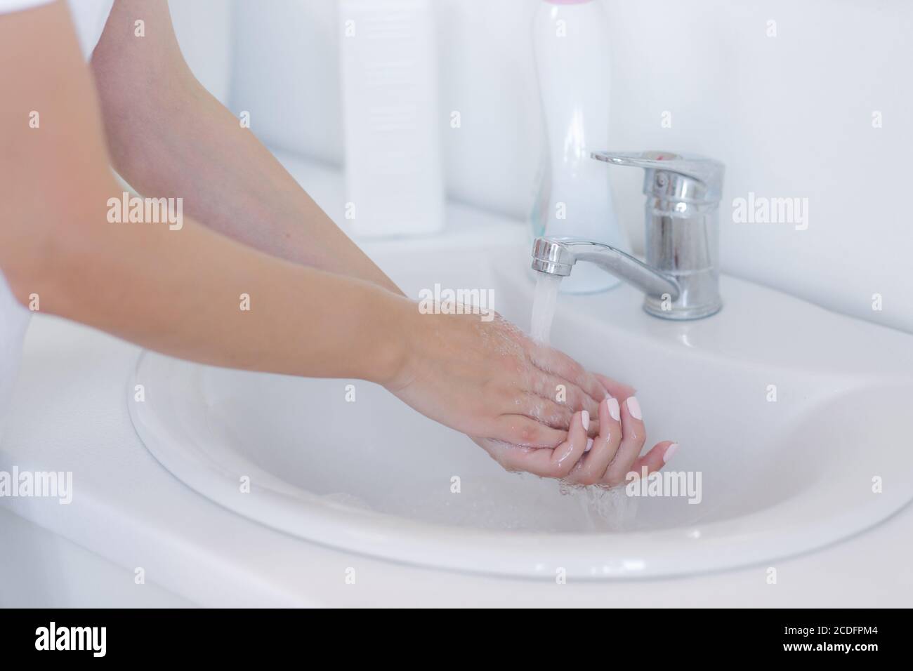 Close up of woman wash hands using liquid soap Stock Photo - Alamy