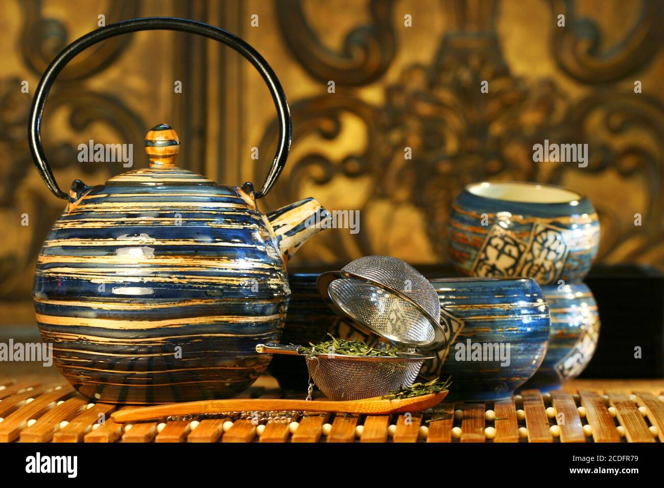 Blue oriental teapot with cups Stock Photo Alamy