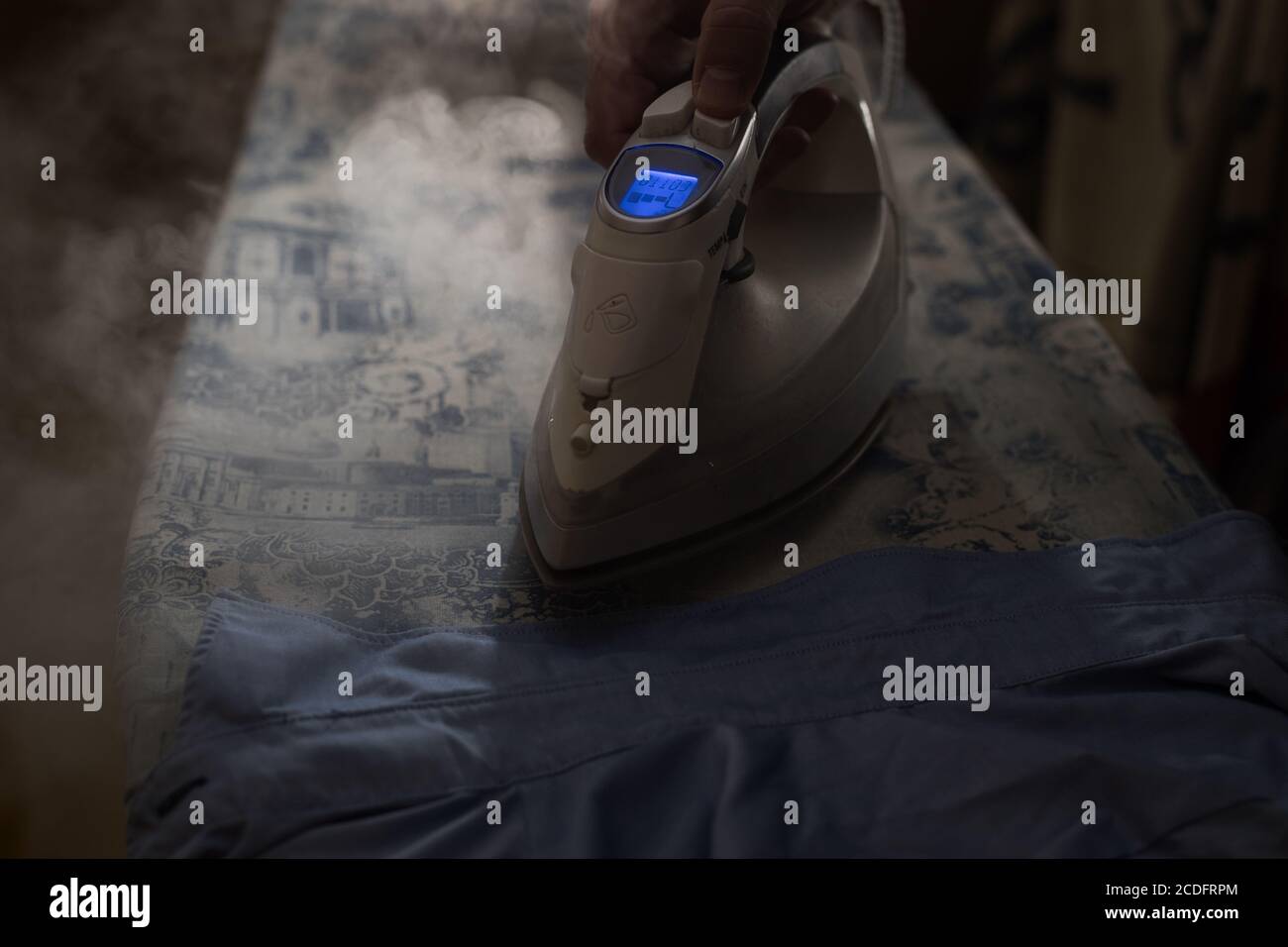 Jan 01, 1970 white male hand ironing a dress shirt Stock Photo Alamy