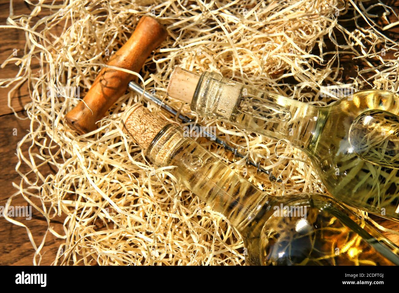 Bottles of wine with cork screw Stock Photo Alamy