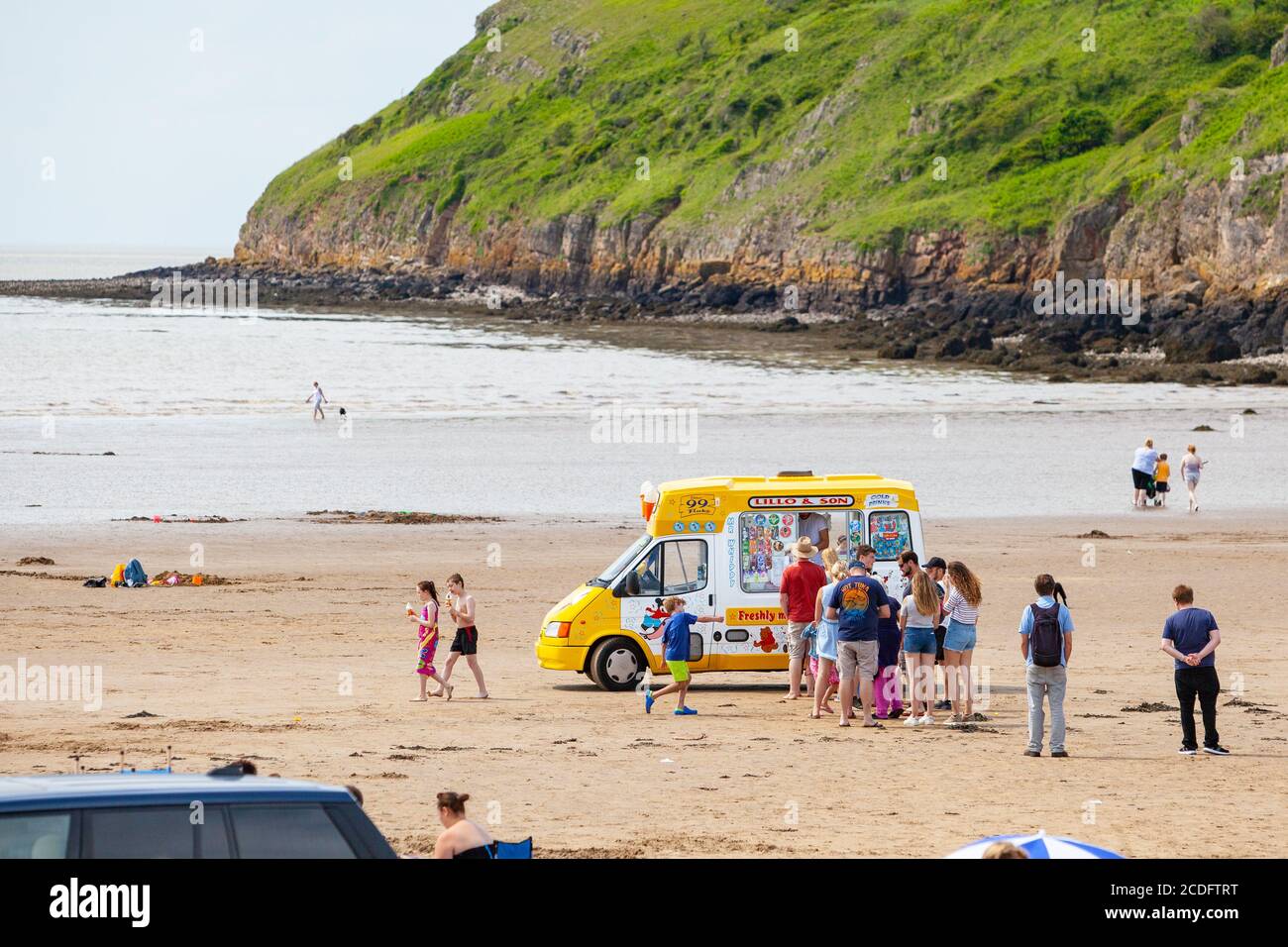 British summer holidays. Brean Sands, Somerset, UK. Ice cream van on the beach Stock Photo
